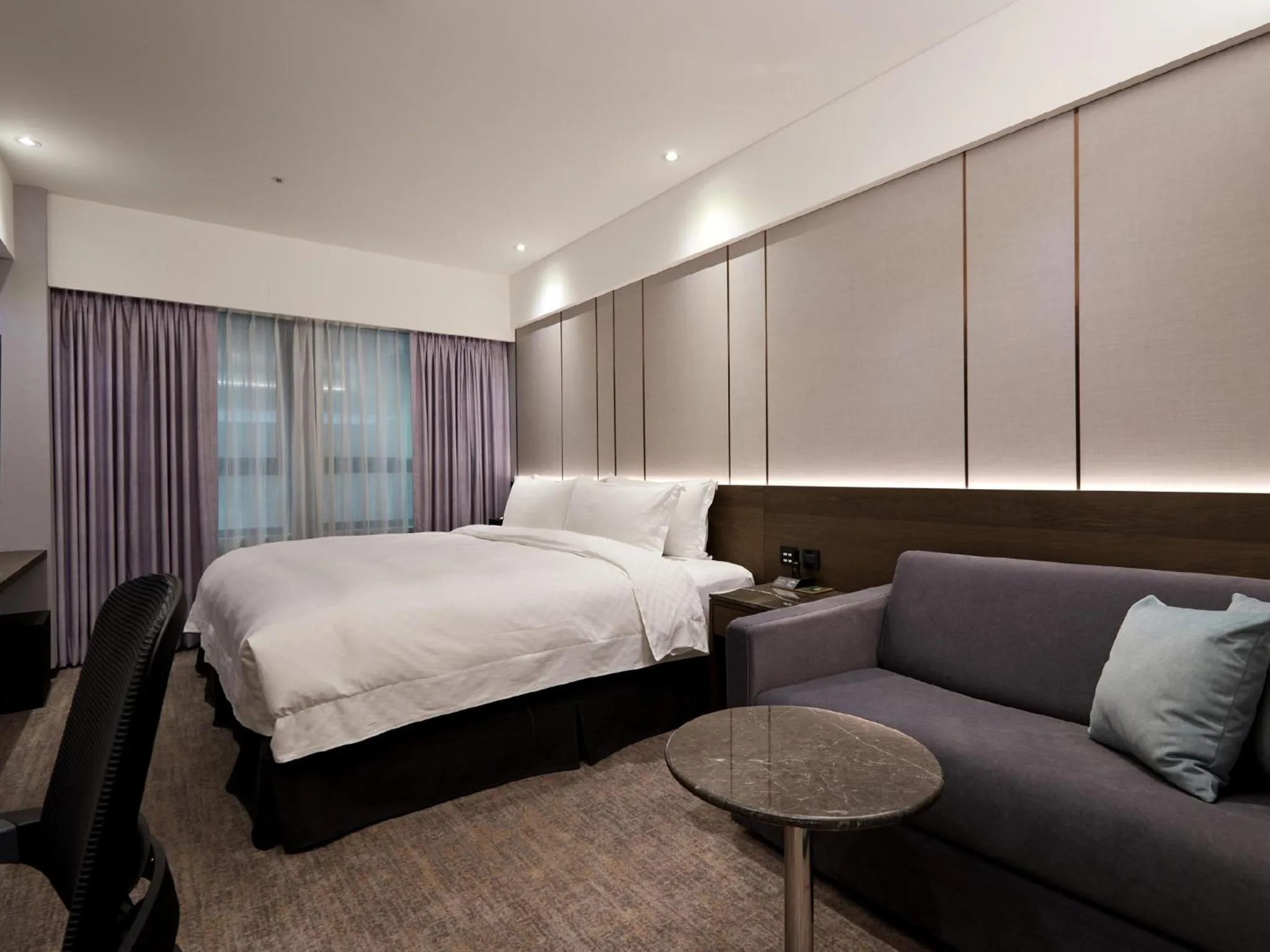 Bed in The Tango Hotel Taipei Linsen