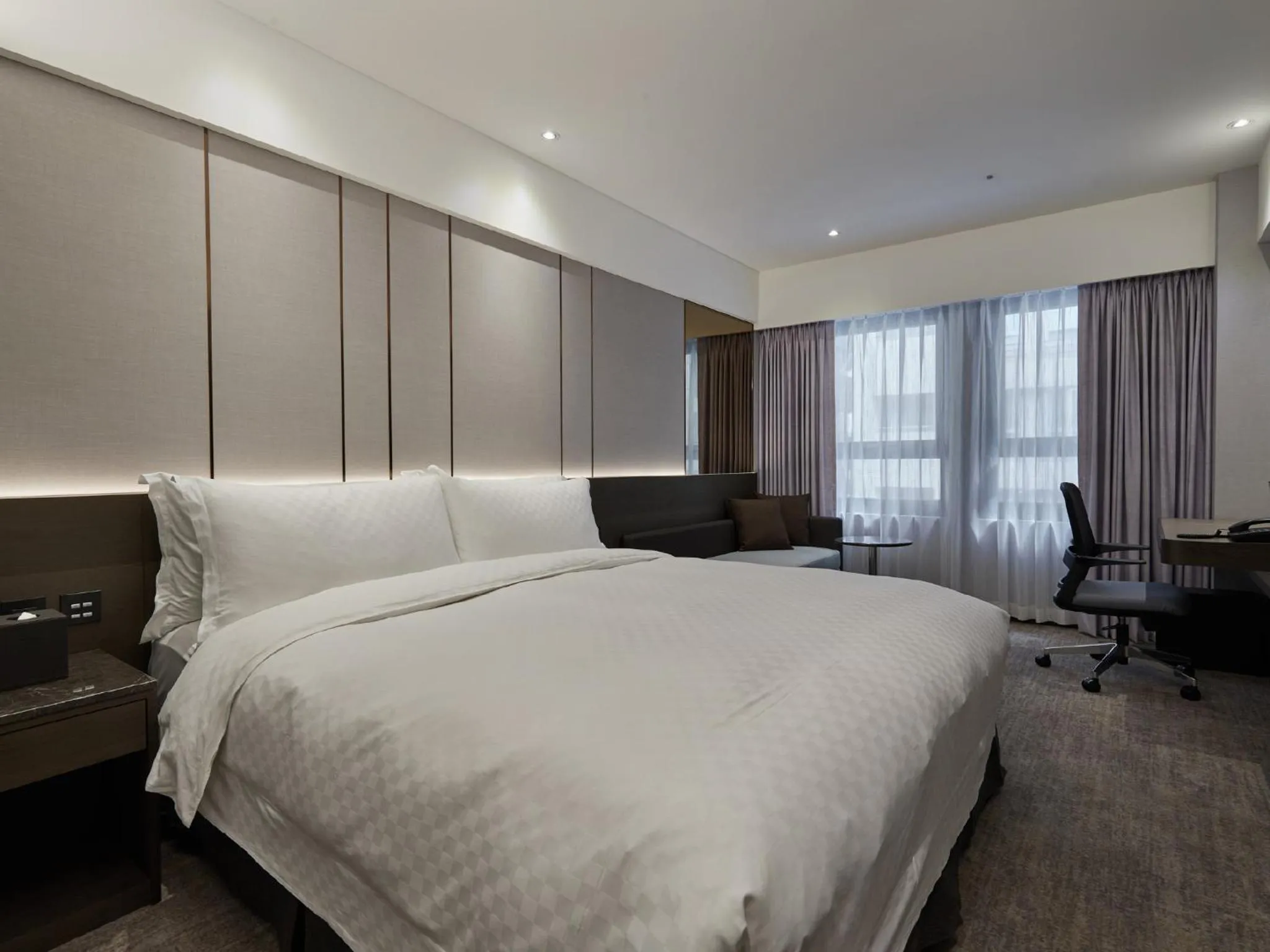 Bed in The Tango Hotel Taipei Linsen