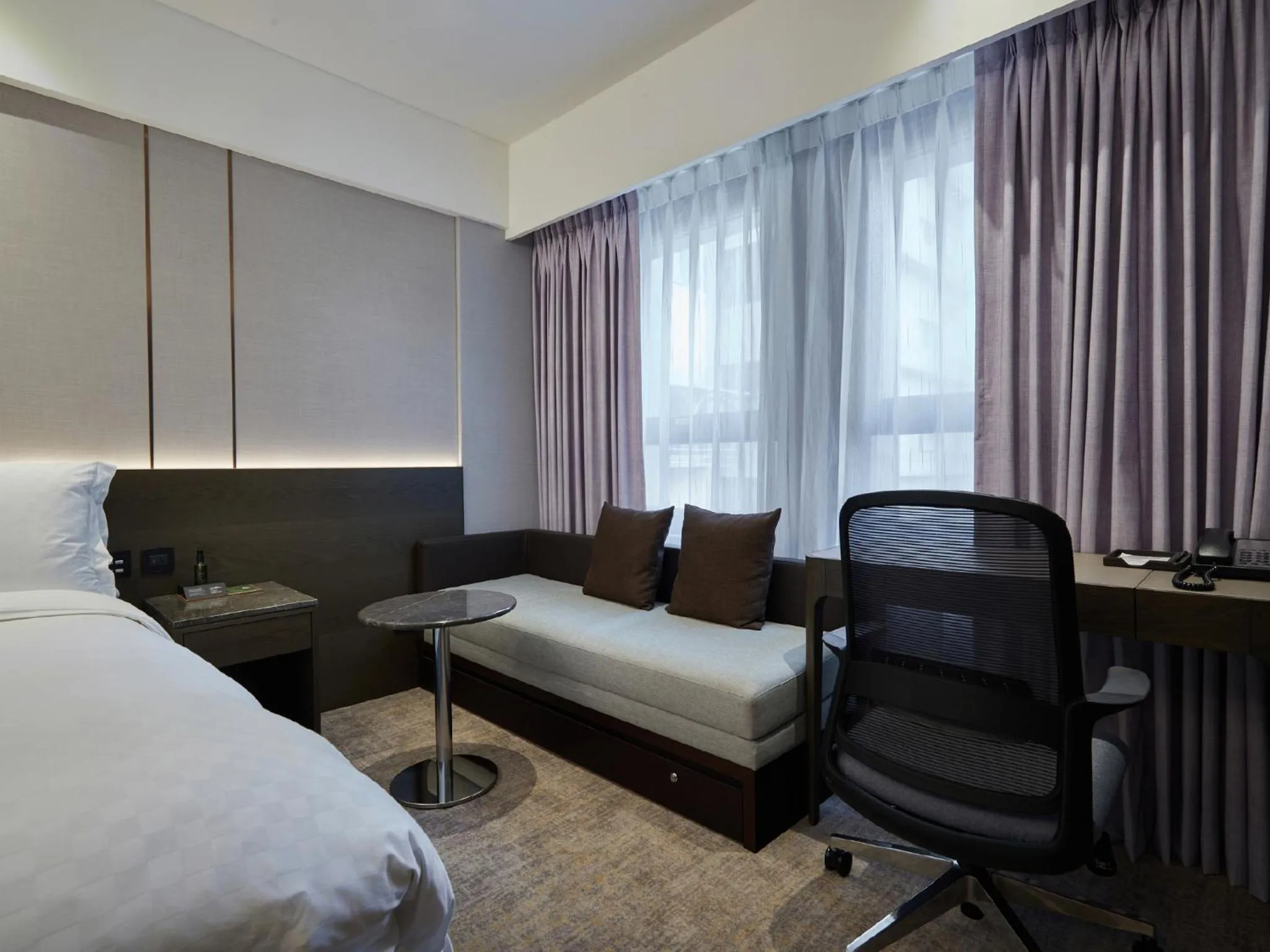 Bed in The Tango Hotel Taipei Linsen