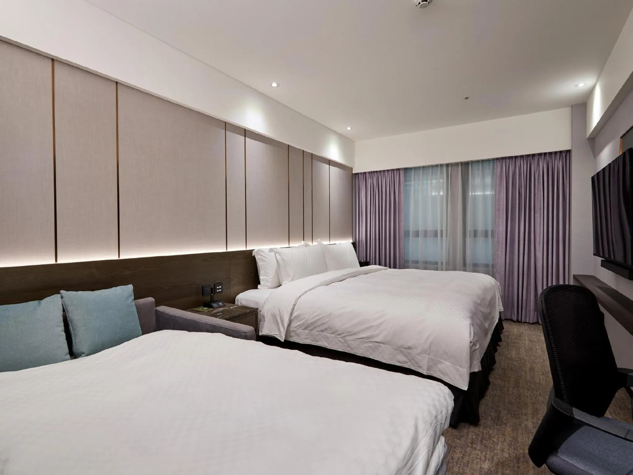 Bed in The Tango Hotel Taipei Linsen