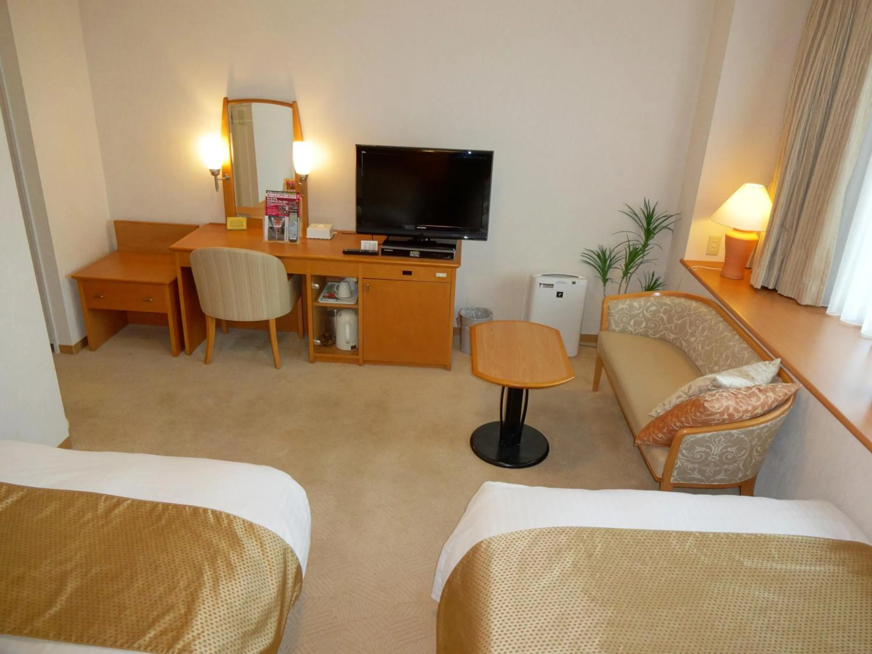 Bed in Kobe Luminous Hotel