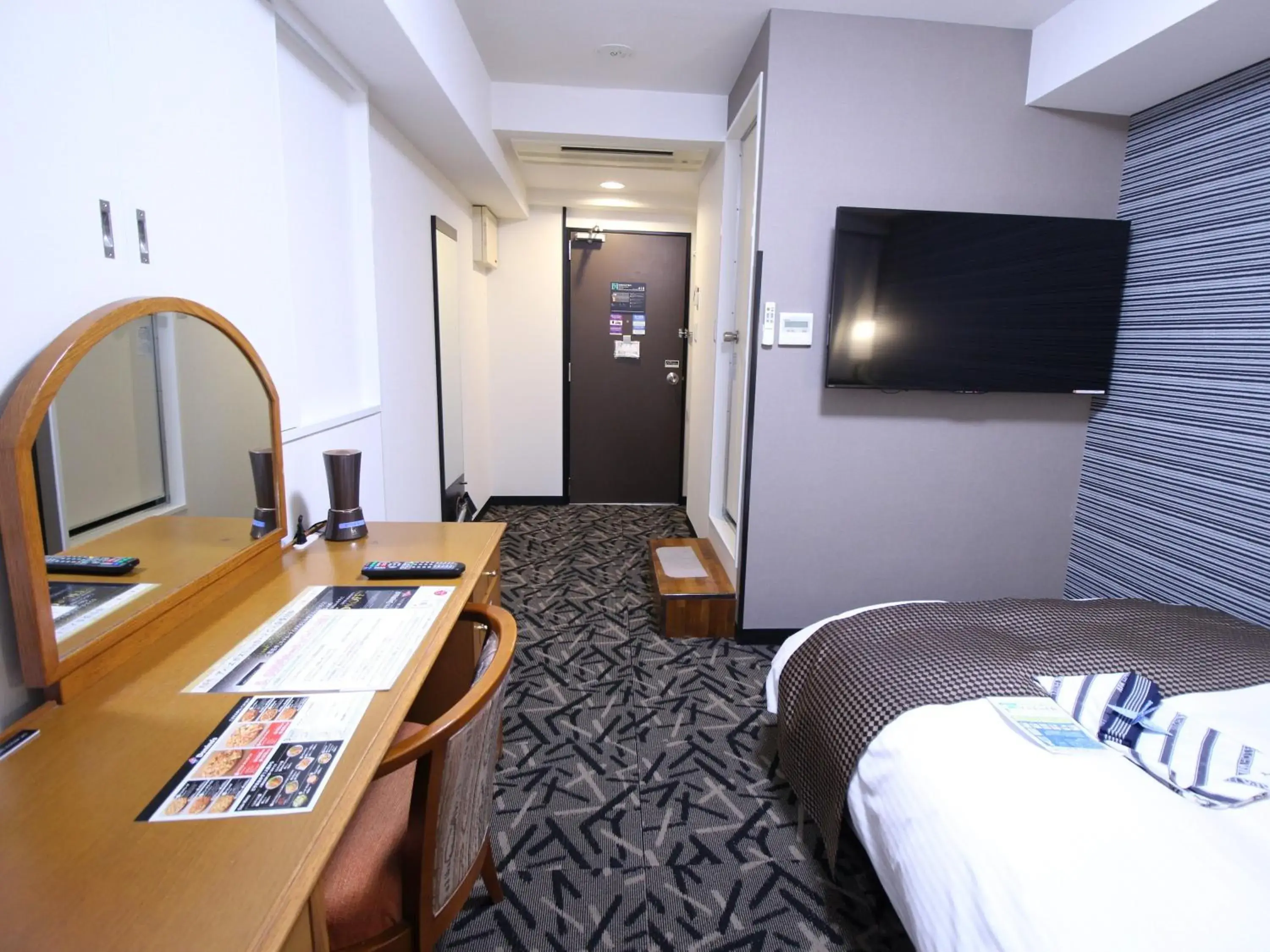 Bed in APA Hotel Hikoneminami Bed in APA Hotel Hikoneminami