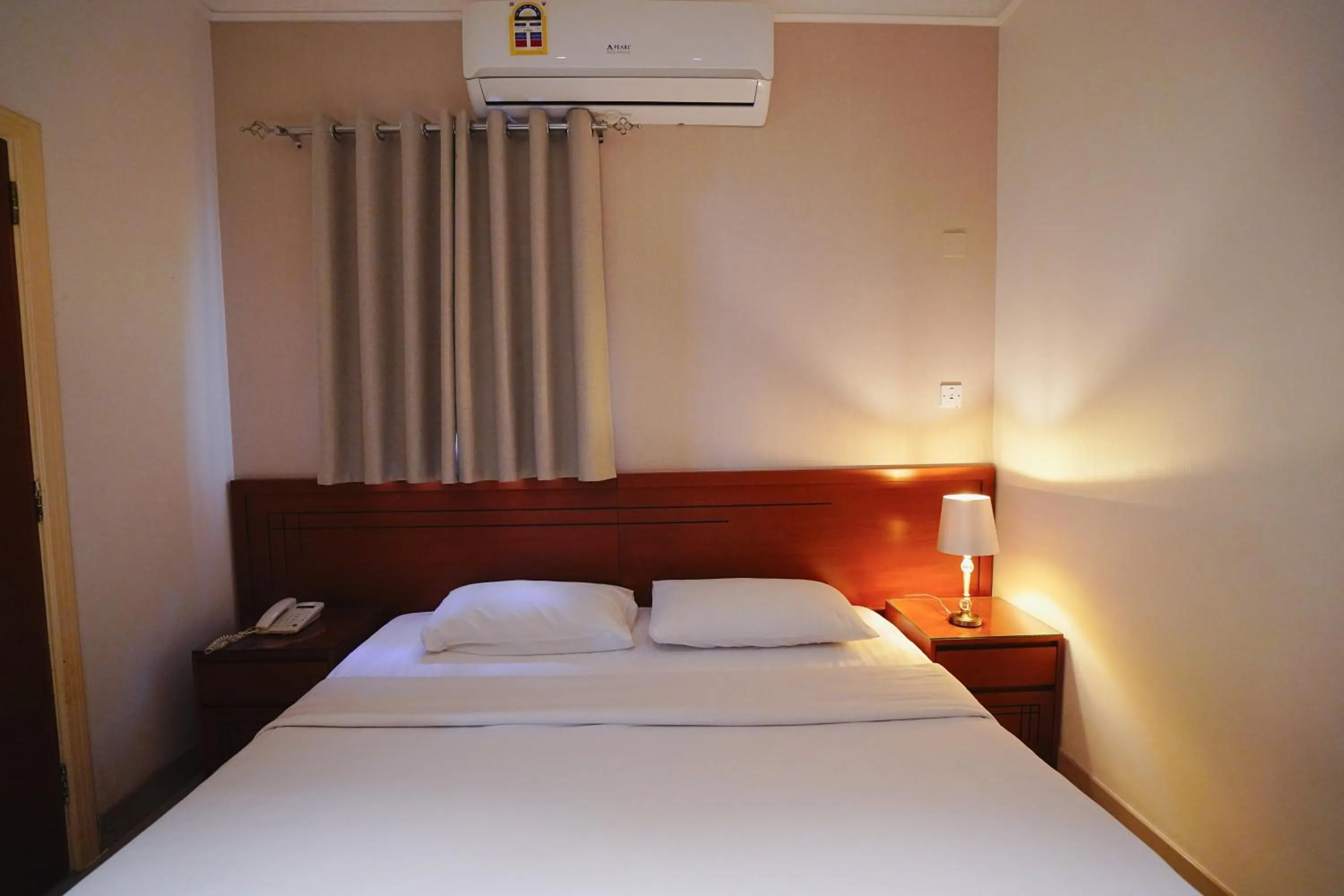 Bed in Tropicana Hotel