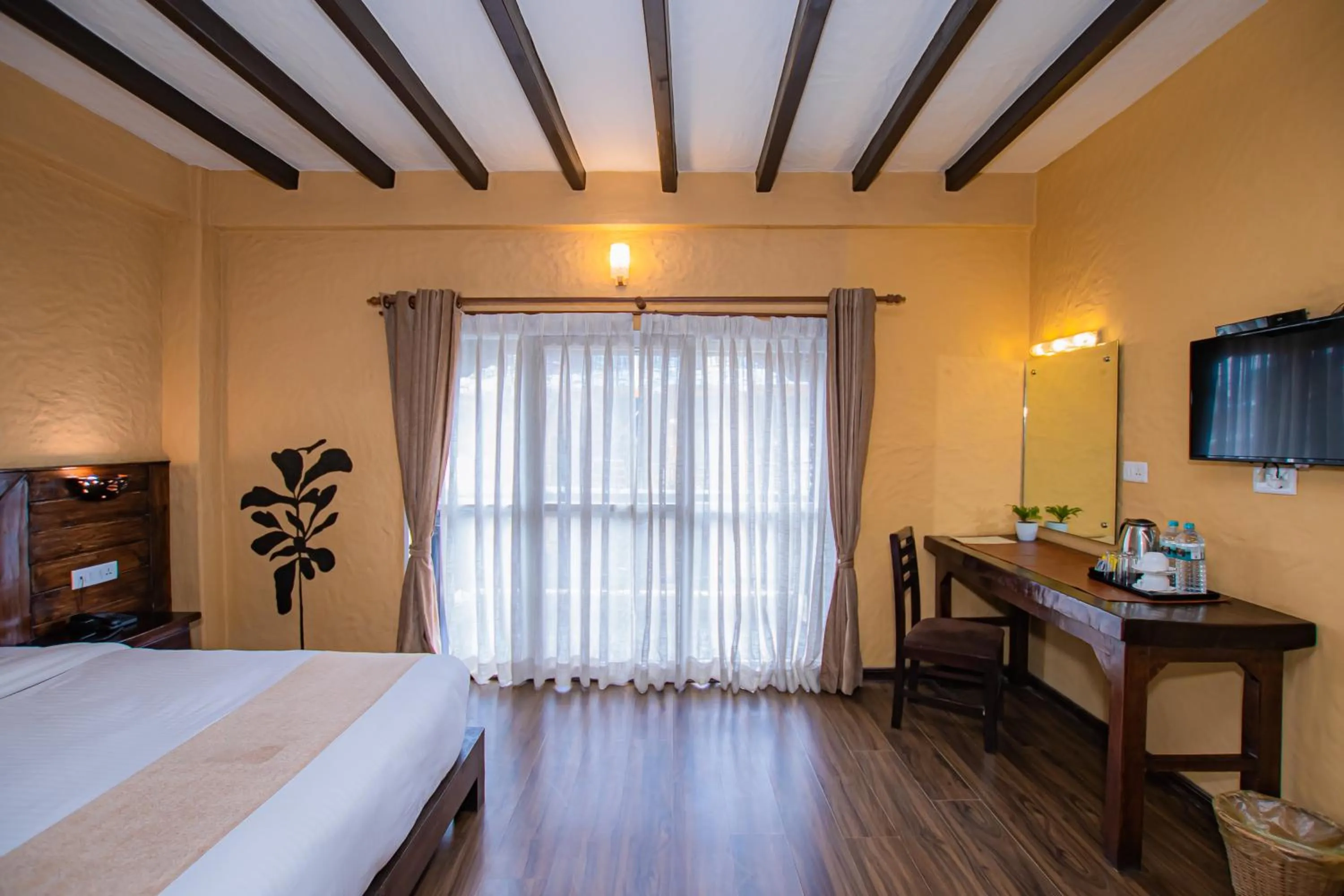 Photo of the whole room, Bed in Pokhara Boutique Hotel
