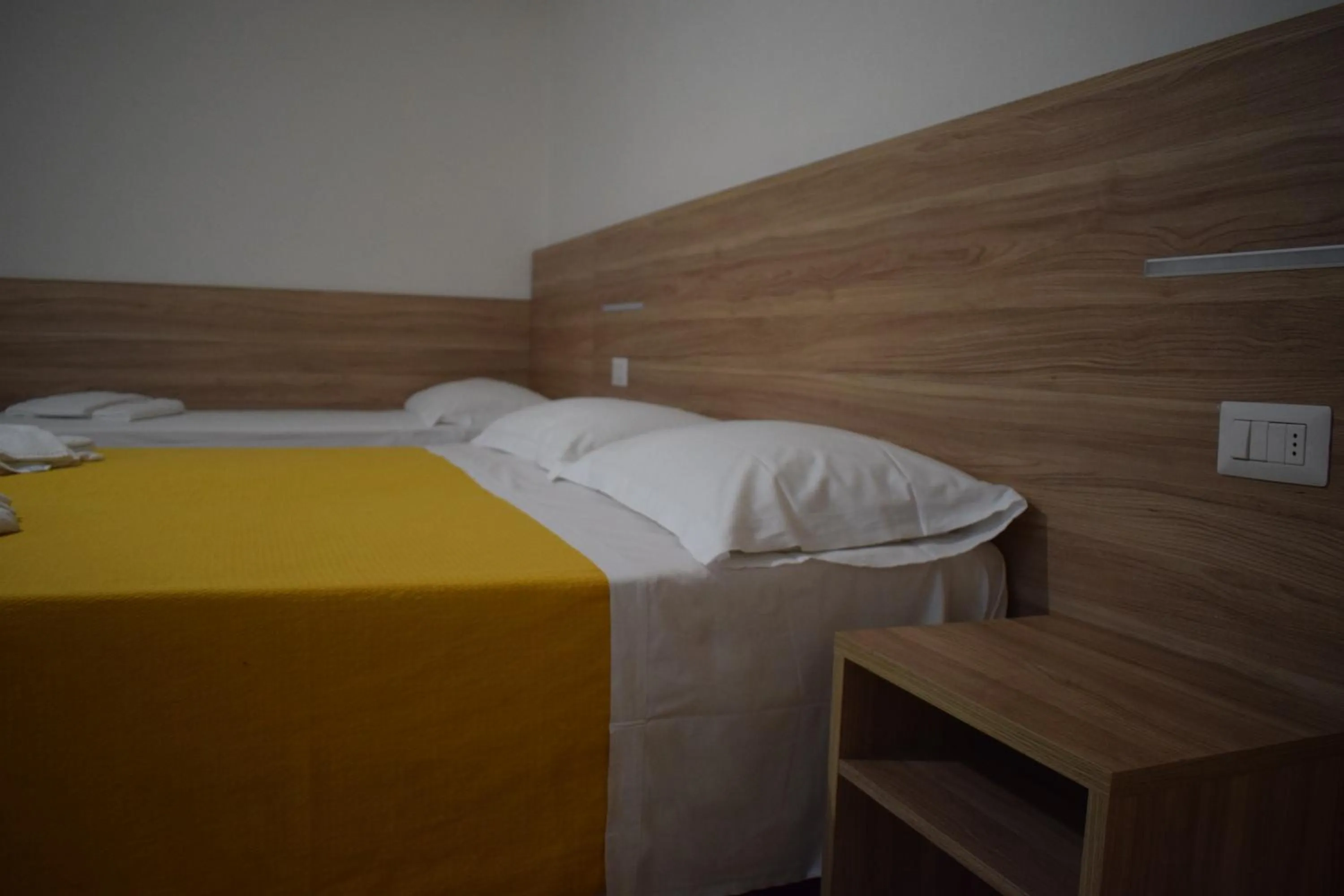 Bed in Golden Dream Guest House