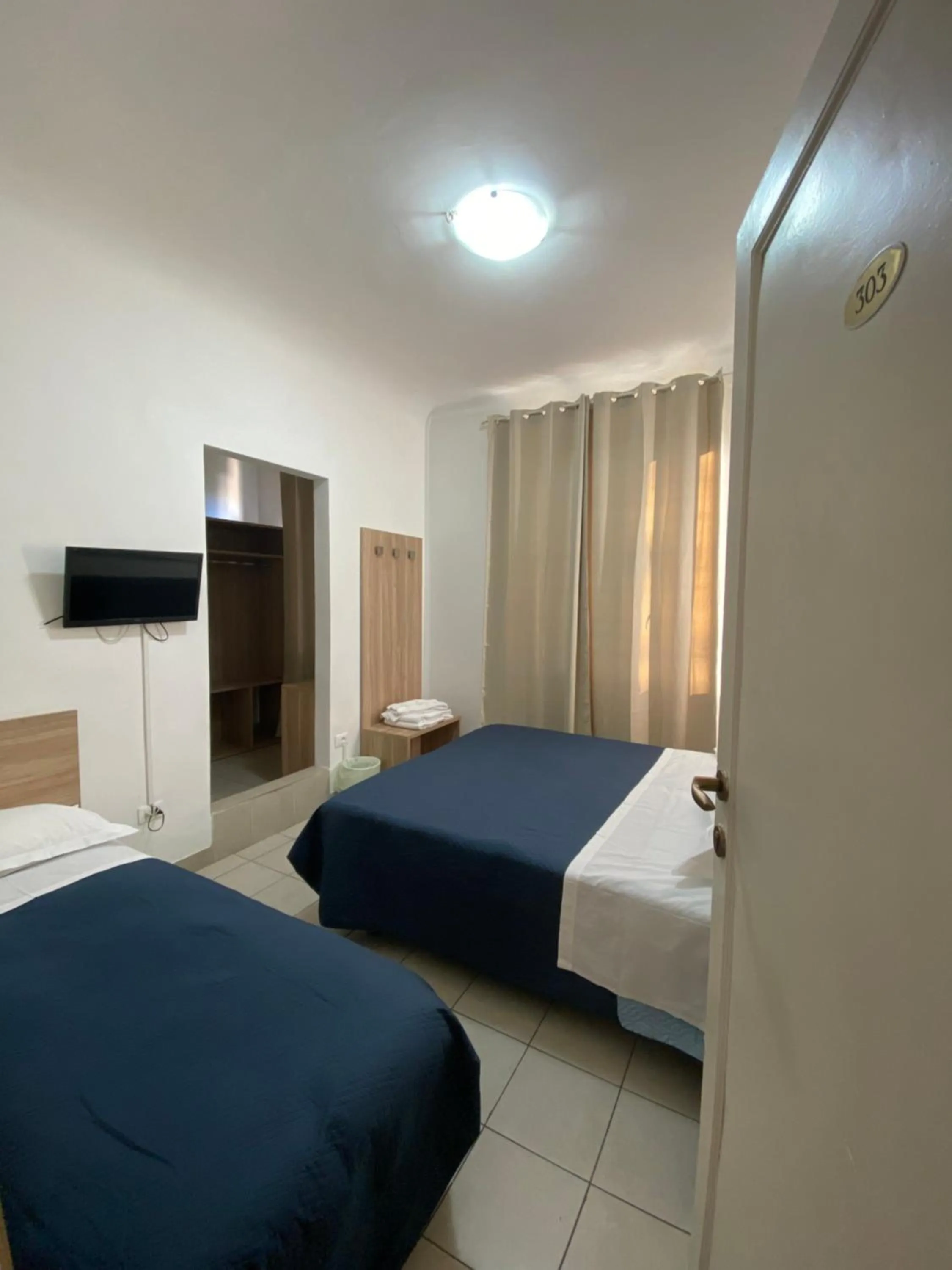 Bed in Golden Dream Guest House