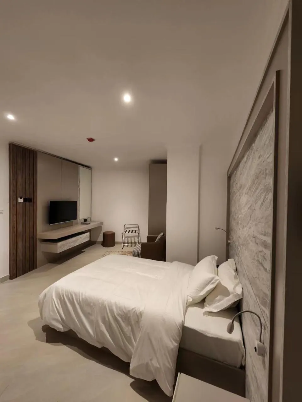 Bed in Imperial Suites Hotel