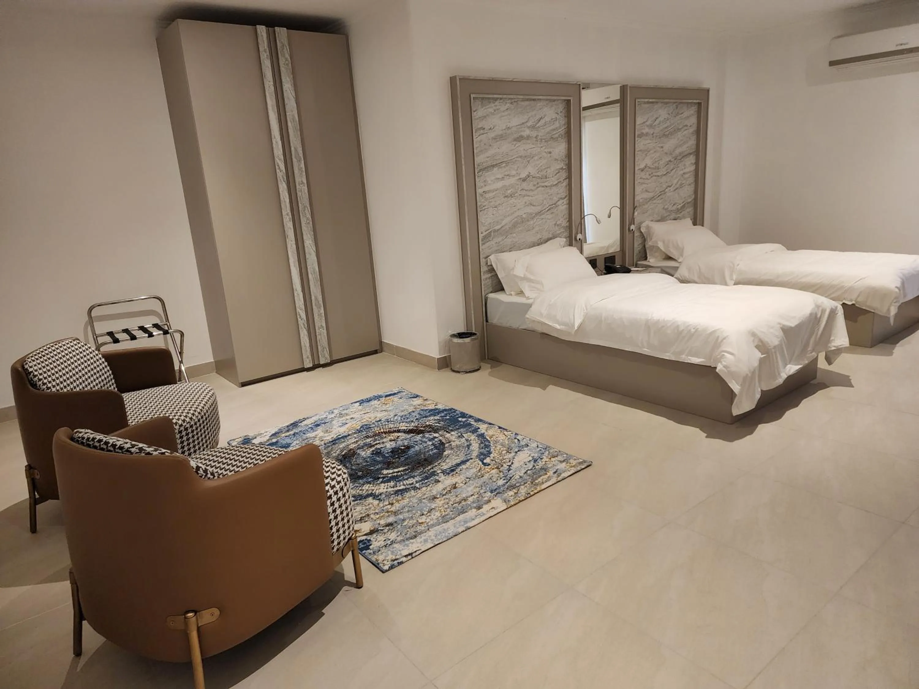 Bed in Imperial Suites Hotel