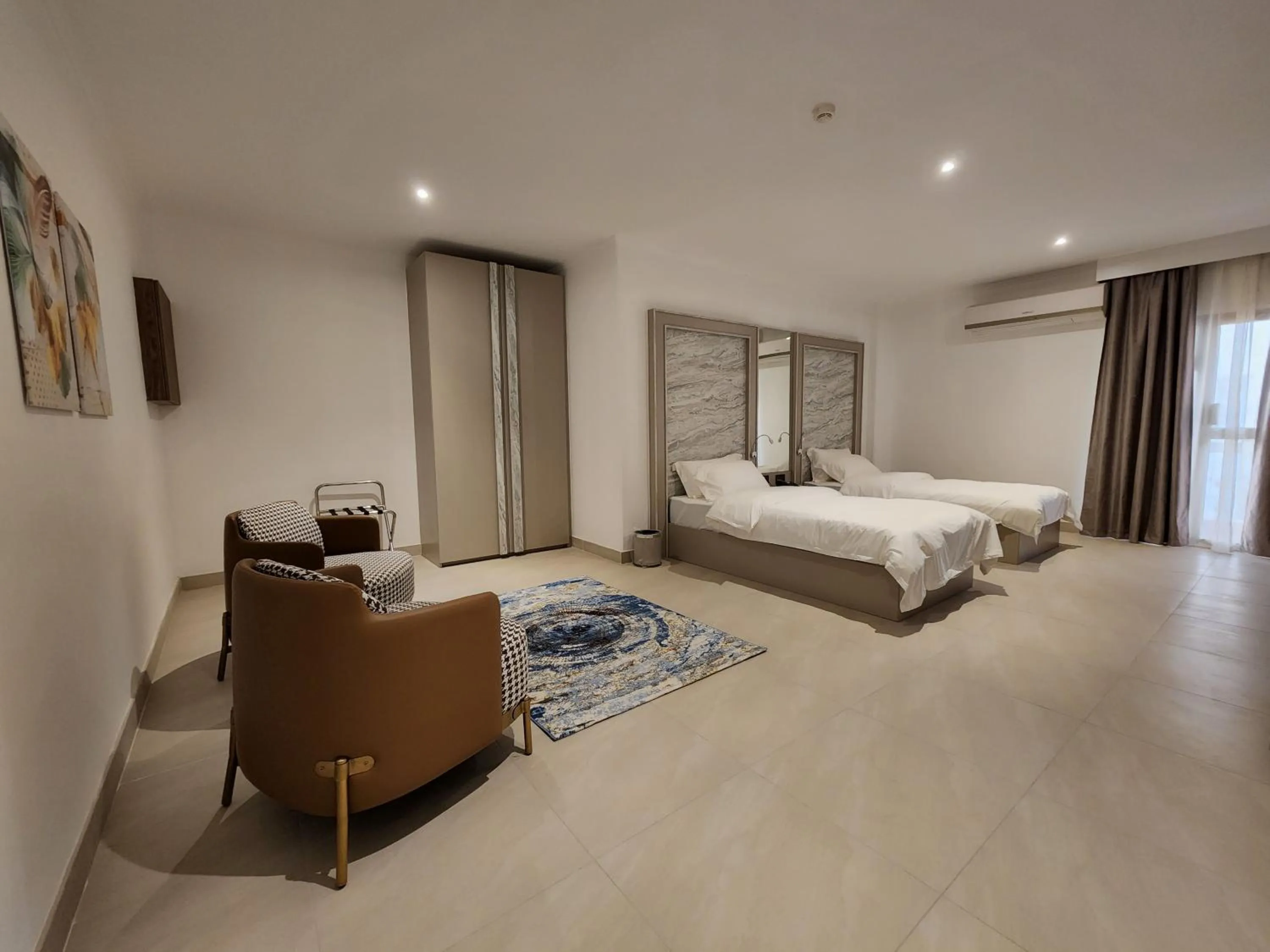 Photo of the whole room, Bed in Imperial Suites Hotel