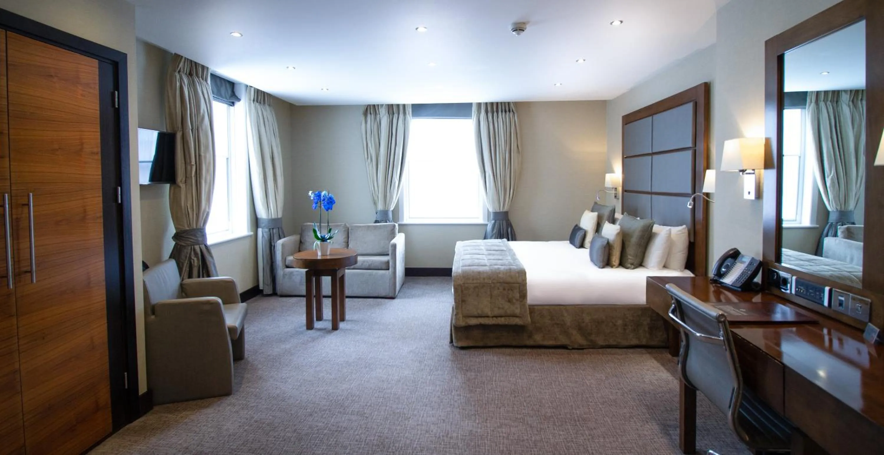 Bedroom in Rochester Hotel by Blue Orchid