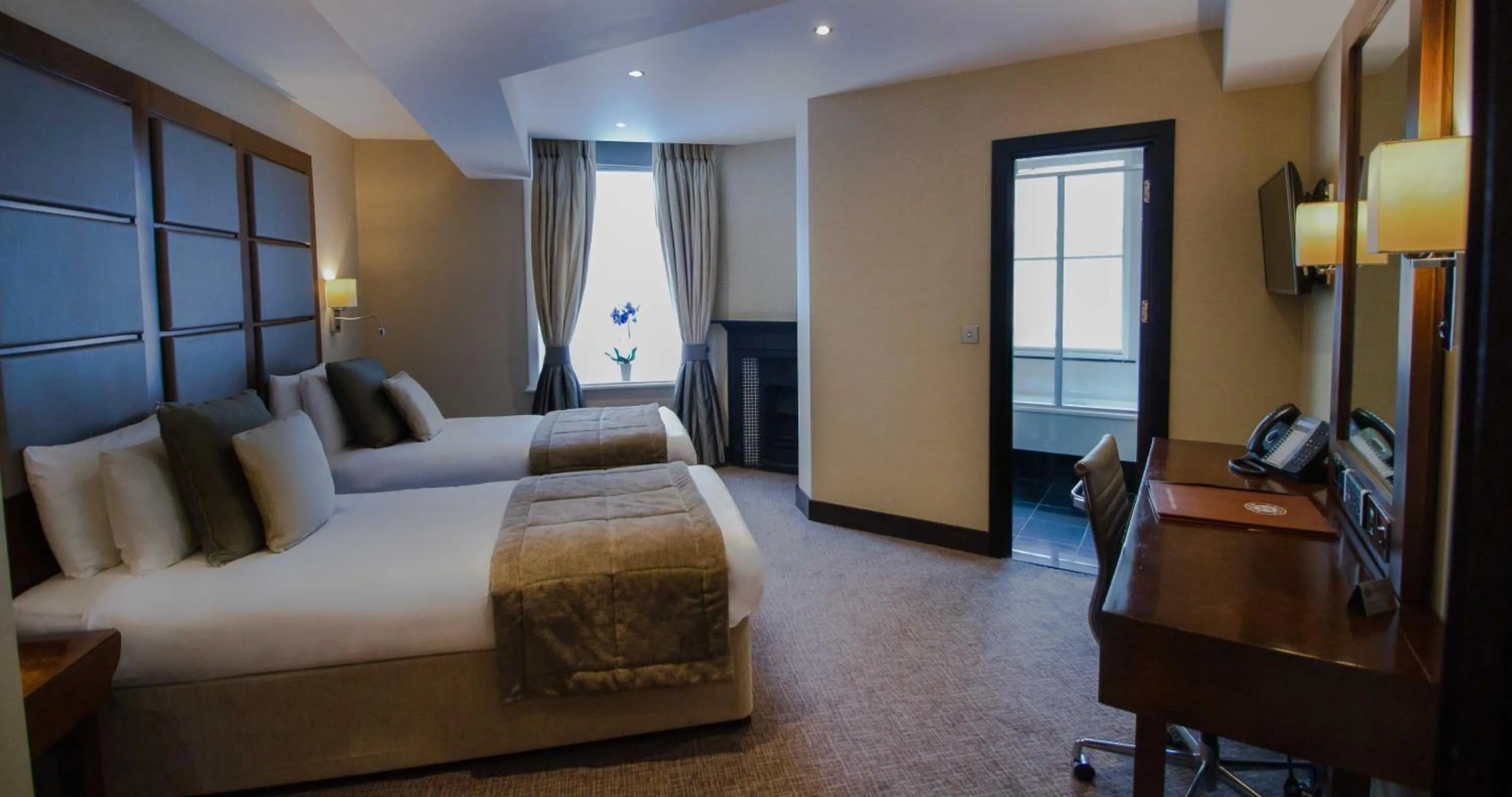 Bedroom in Rochester Hotel by Blue Orchid