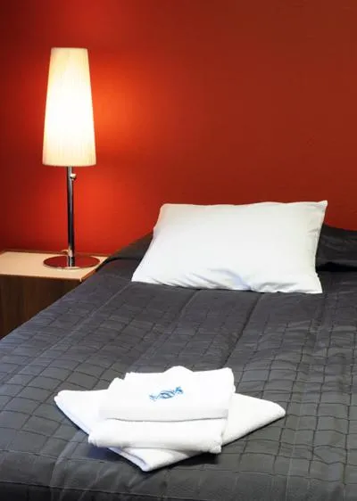 Bed in Finlandia Hotel Lumiainen