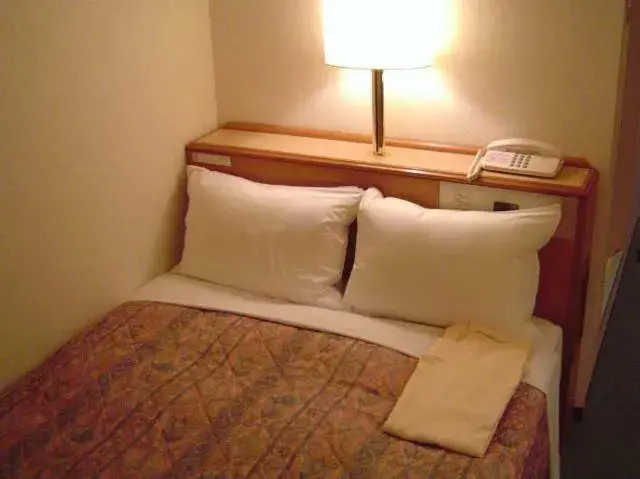 Bed in Hashimoto Park Hotel Bed in Hashimoto Park Hotel