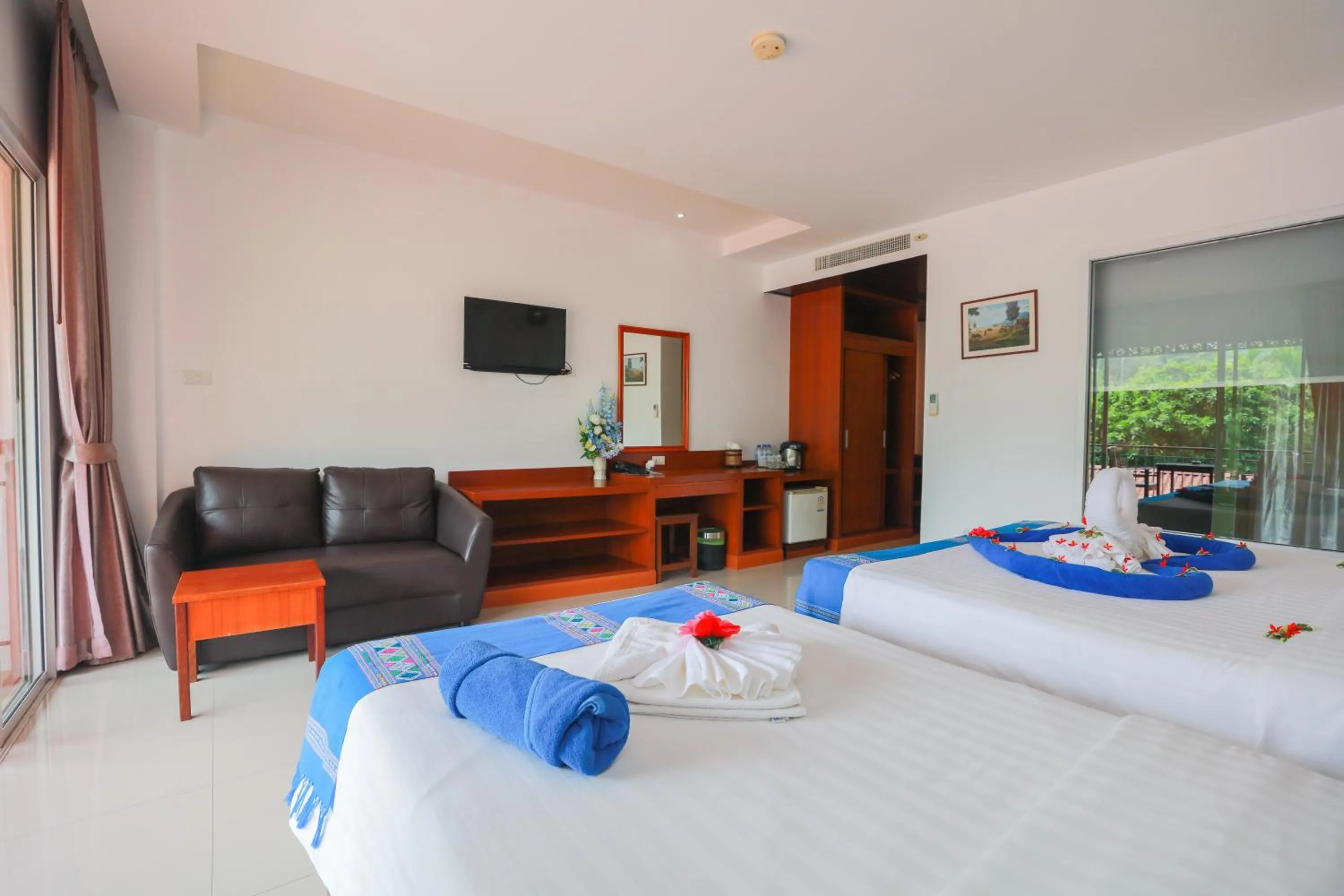 Bed in Baan Vanida Garden Resort