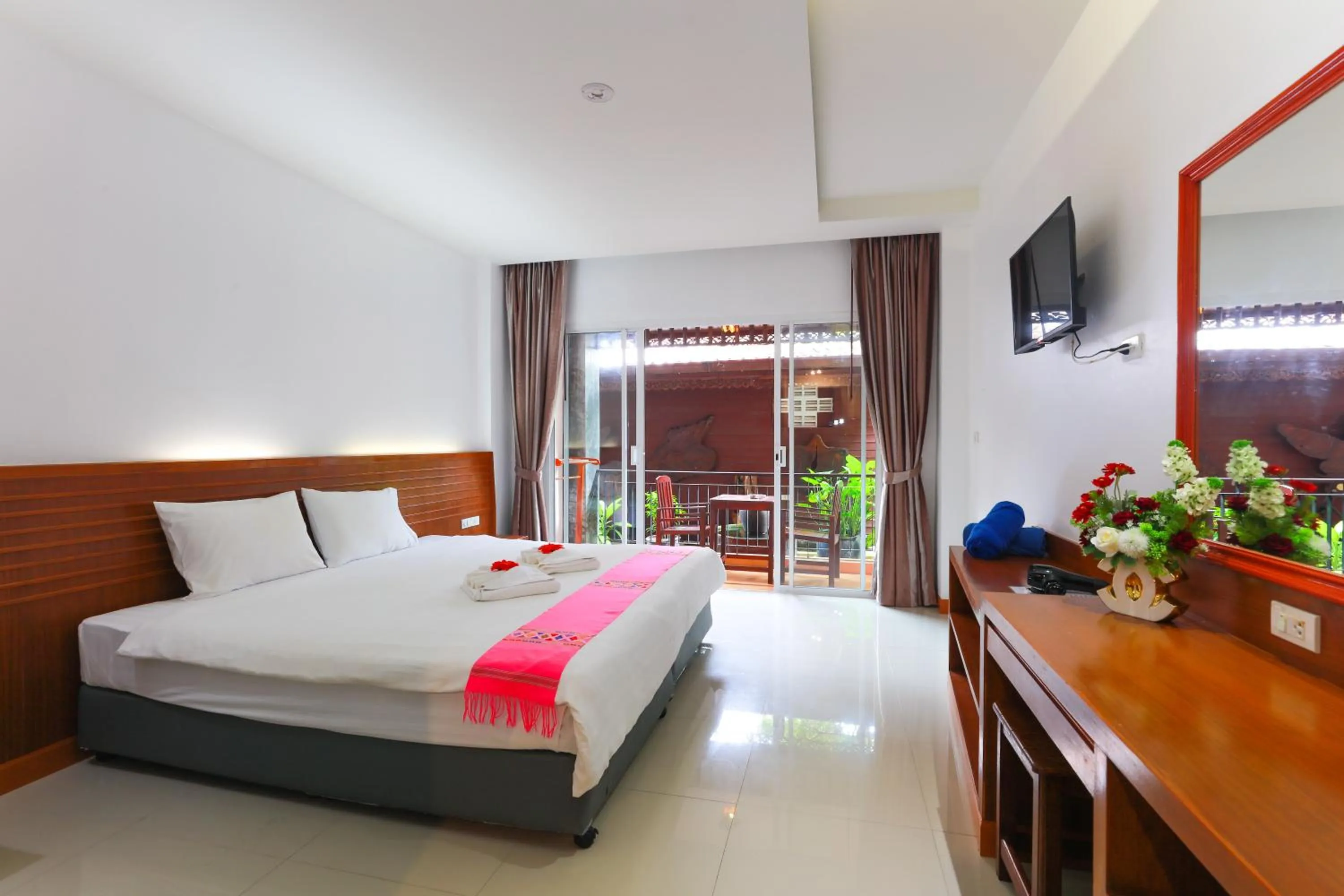 Bed in Baan Vanida Garden Resort