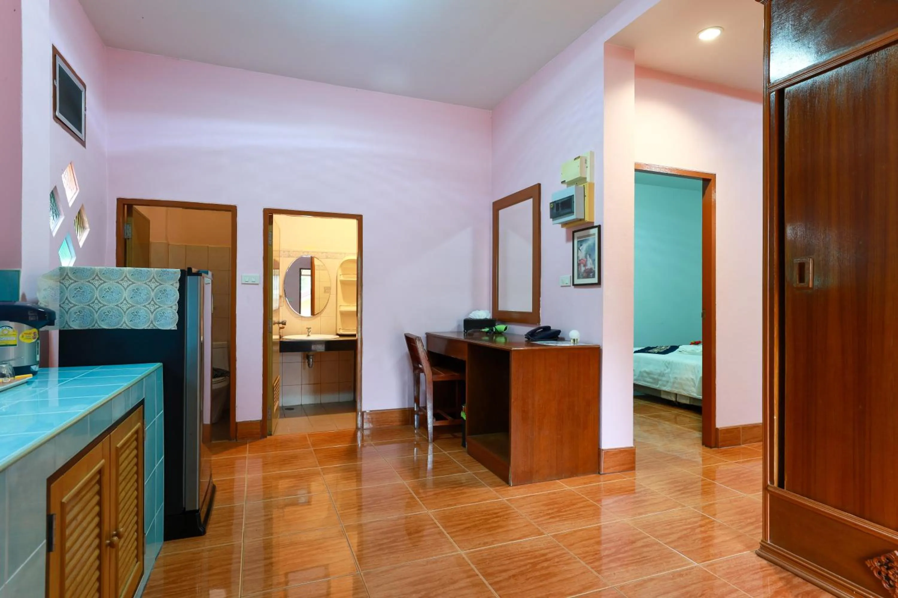 Bed in Baan Vanida Garden Resort