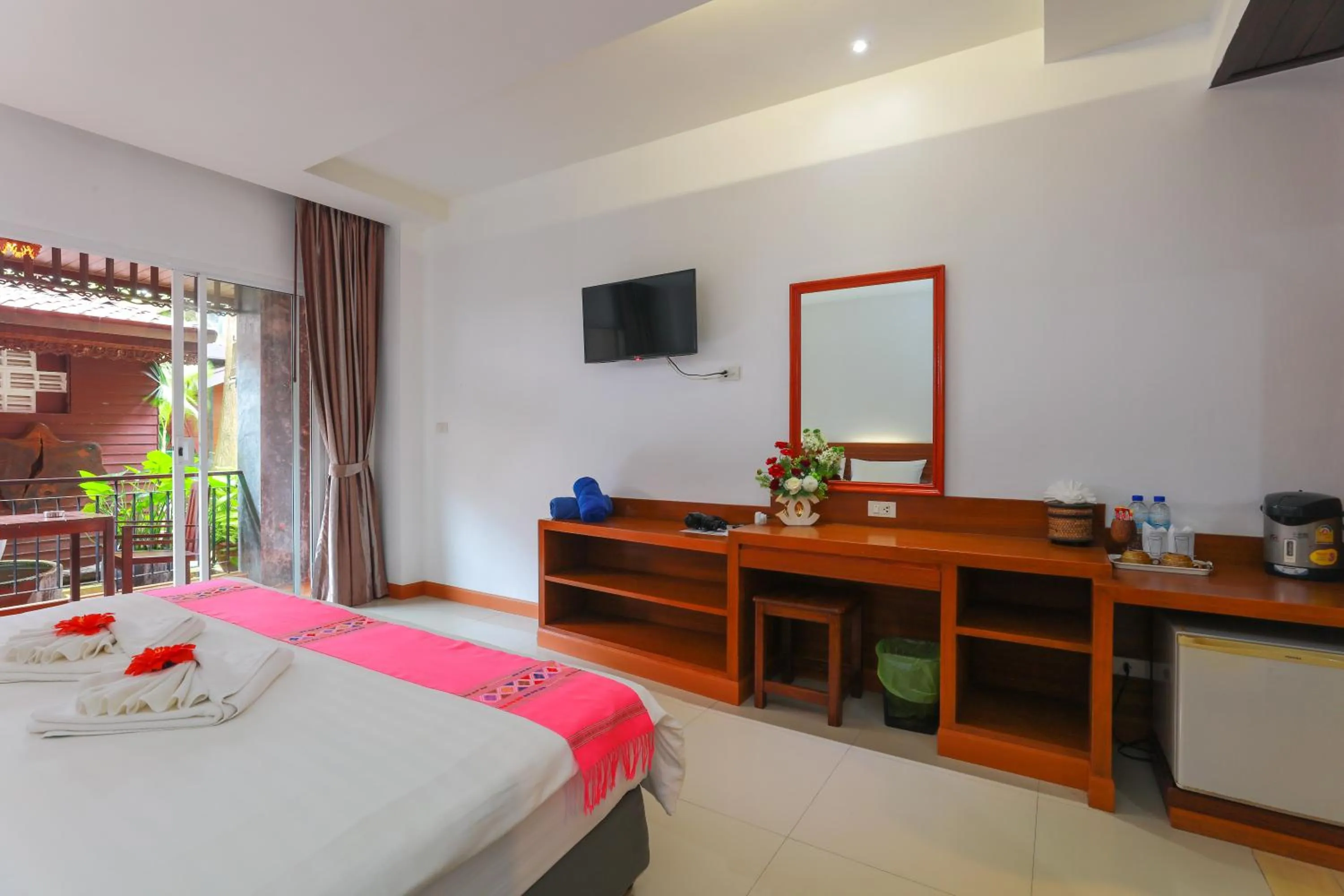 Bed in Baan Vanida Garden Resort