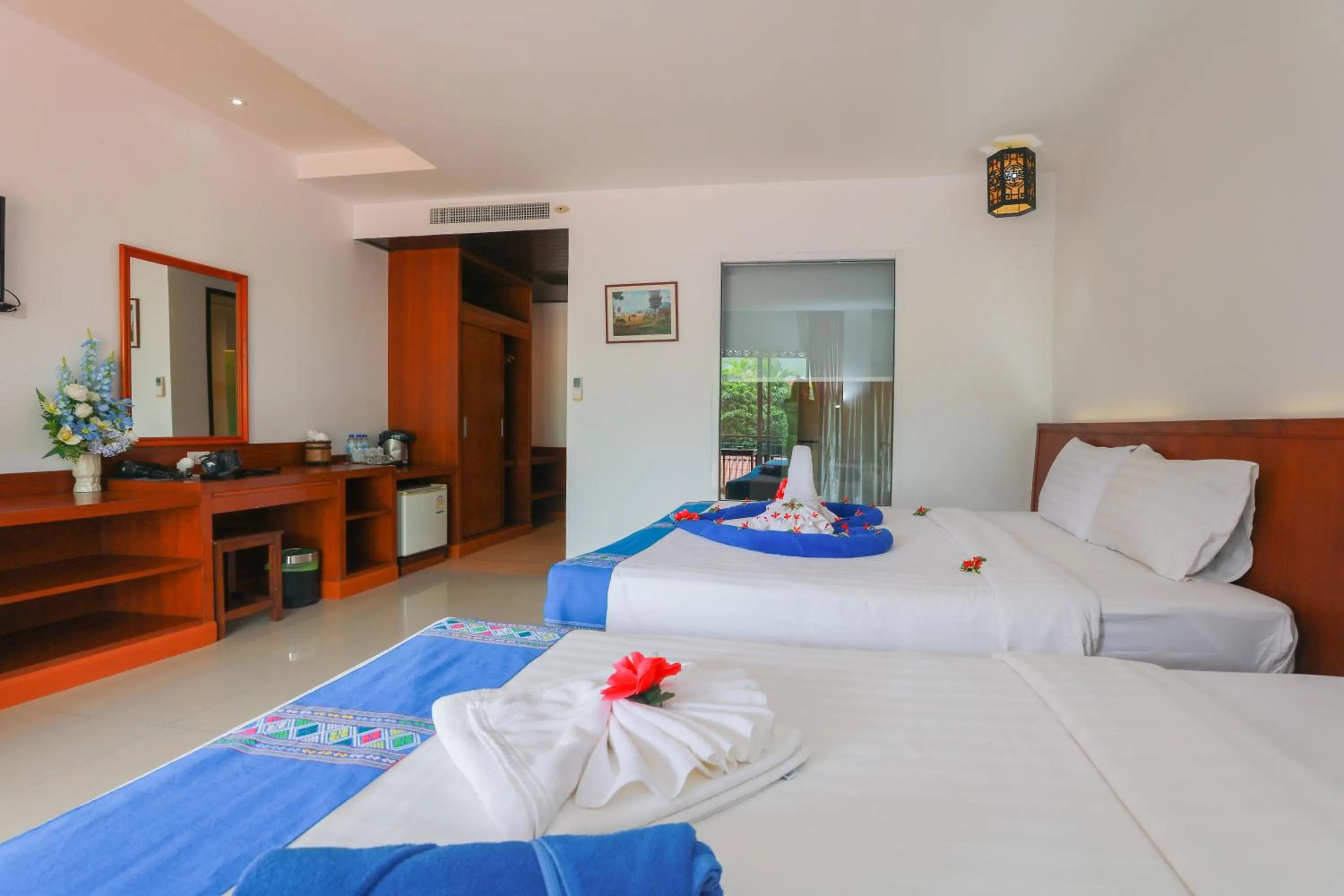 Bed in Baan Vanida Garden Resort