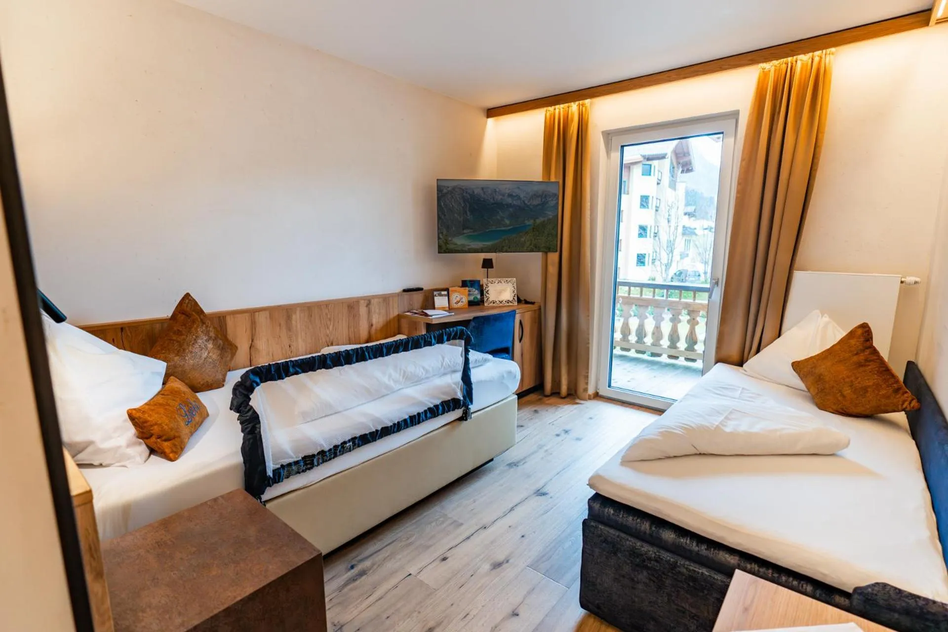 Bed in Liebes Caroline 4-Sterne-Hotel