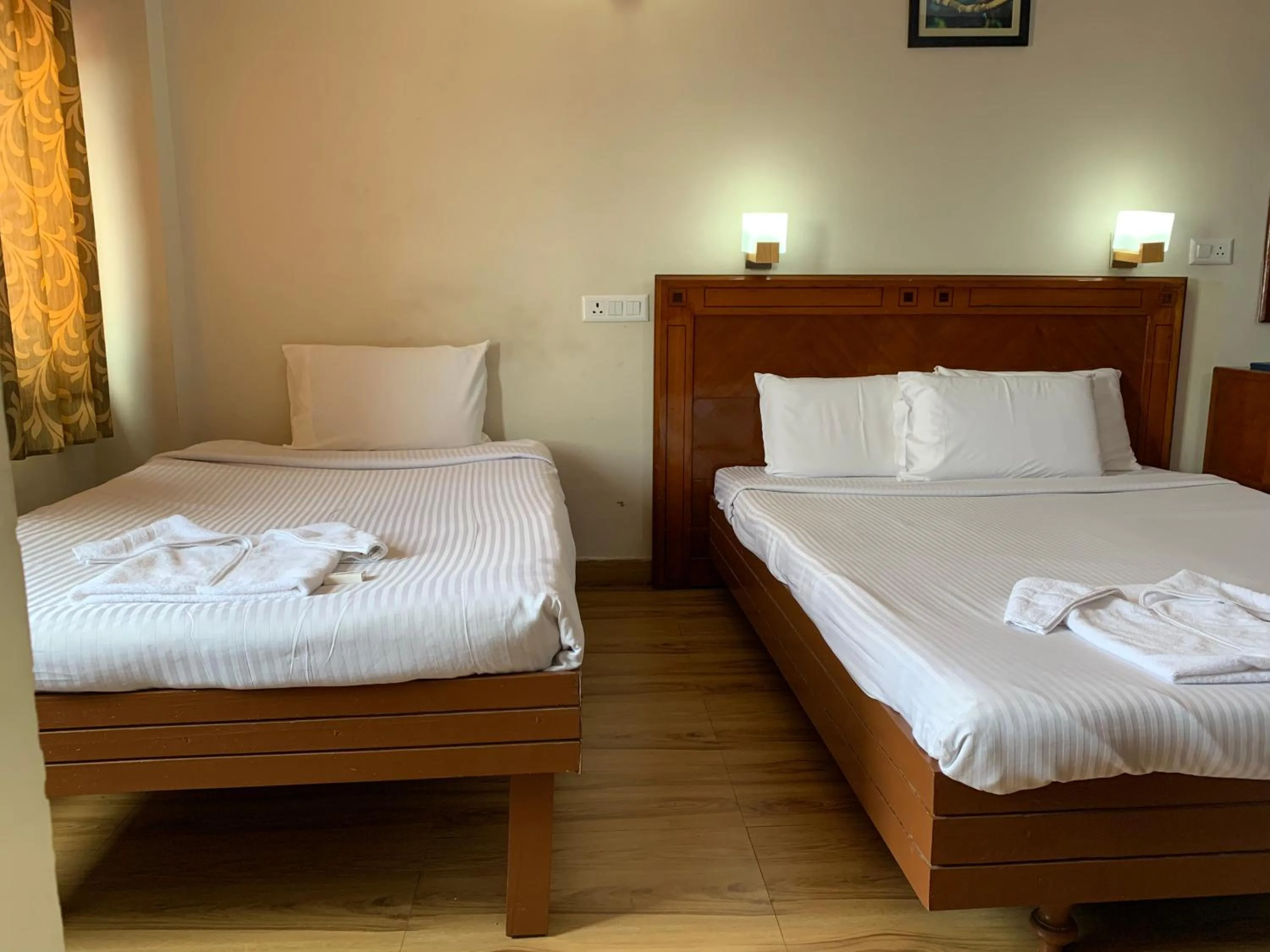 Bed in Hotel Jc Grand