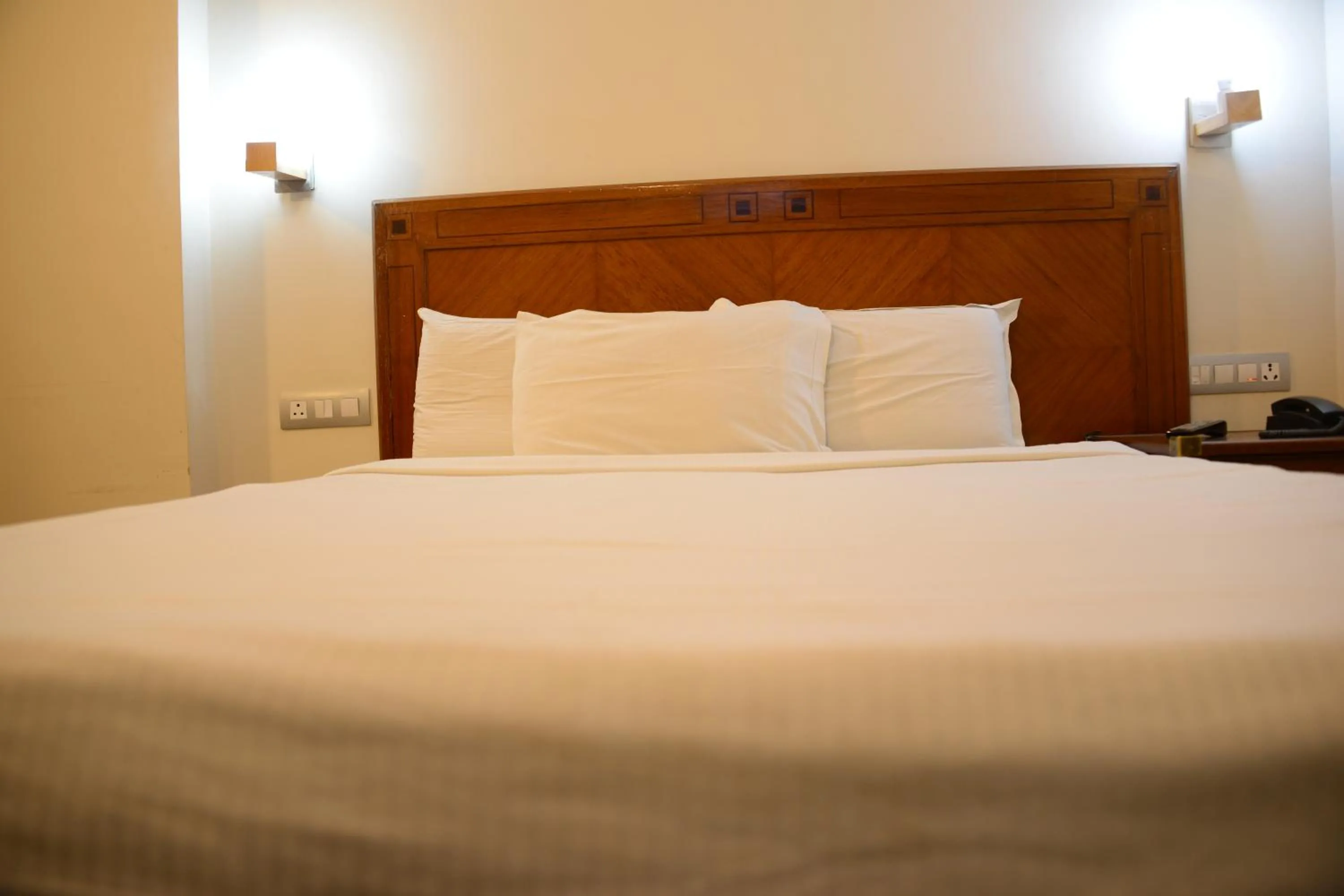 Bed in Hotel Jc Grand