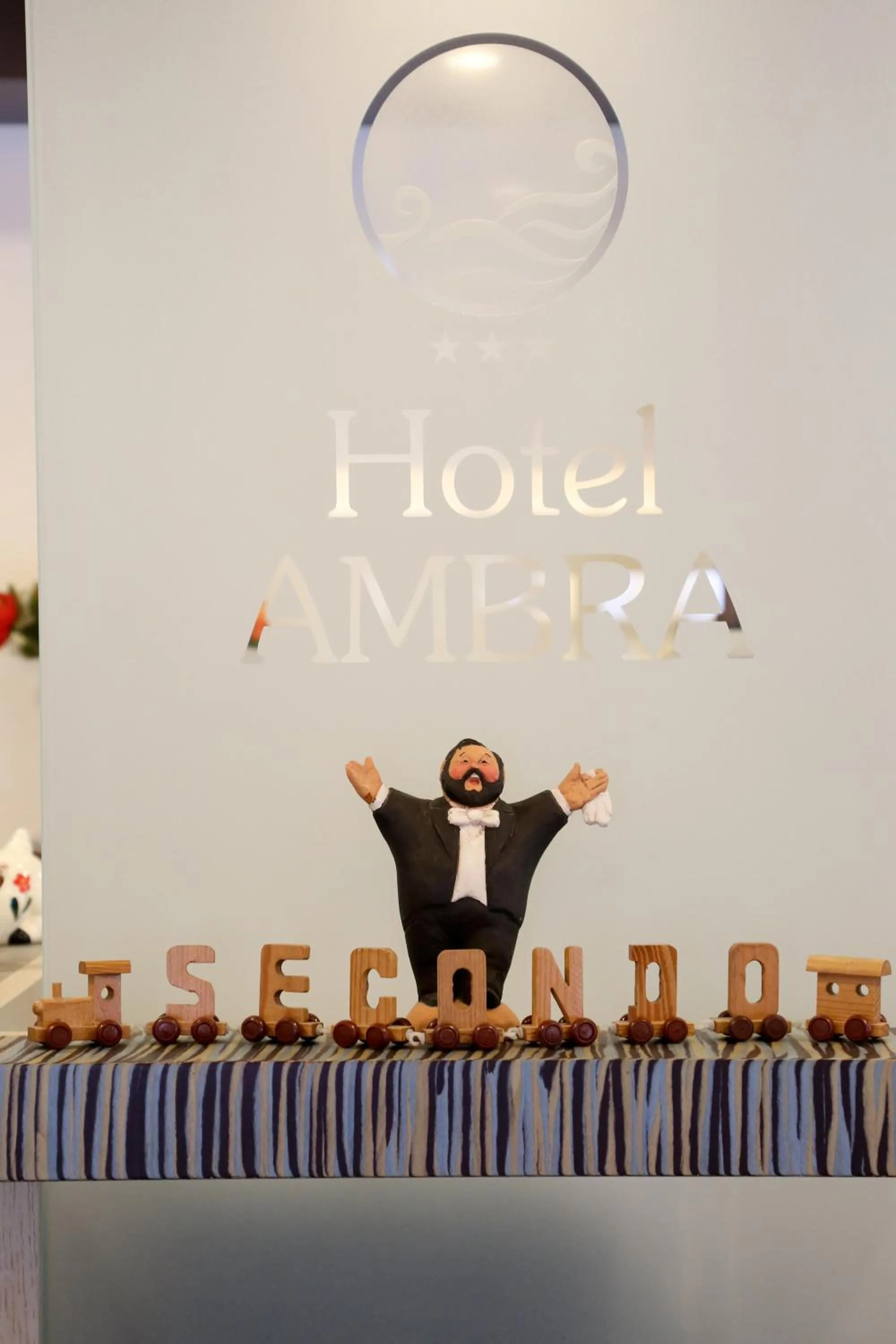 Property logo or sign in Hotel Ambra