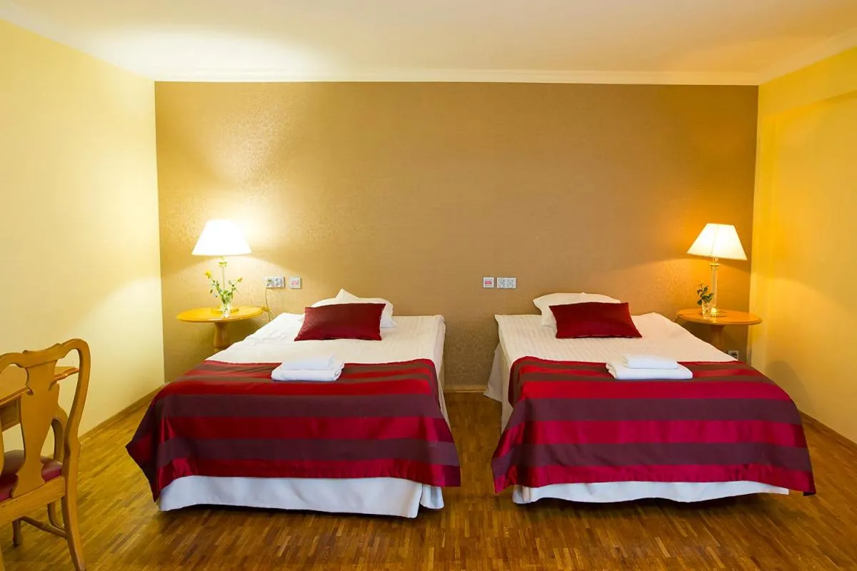 Bed in Hotel Mir-Jan SPA