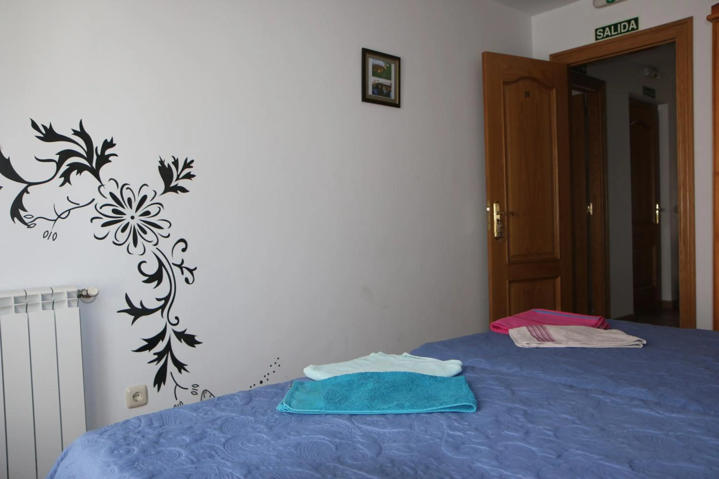 Bed in Hostal La Plaza