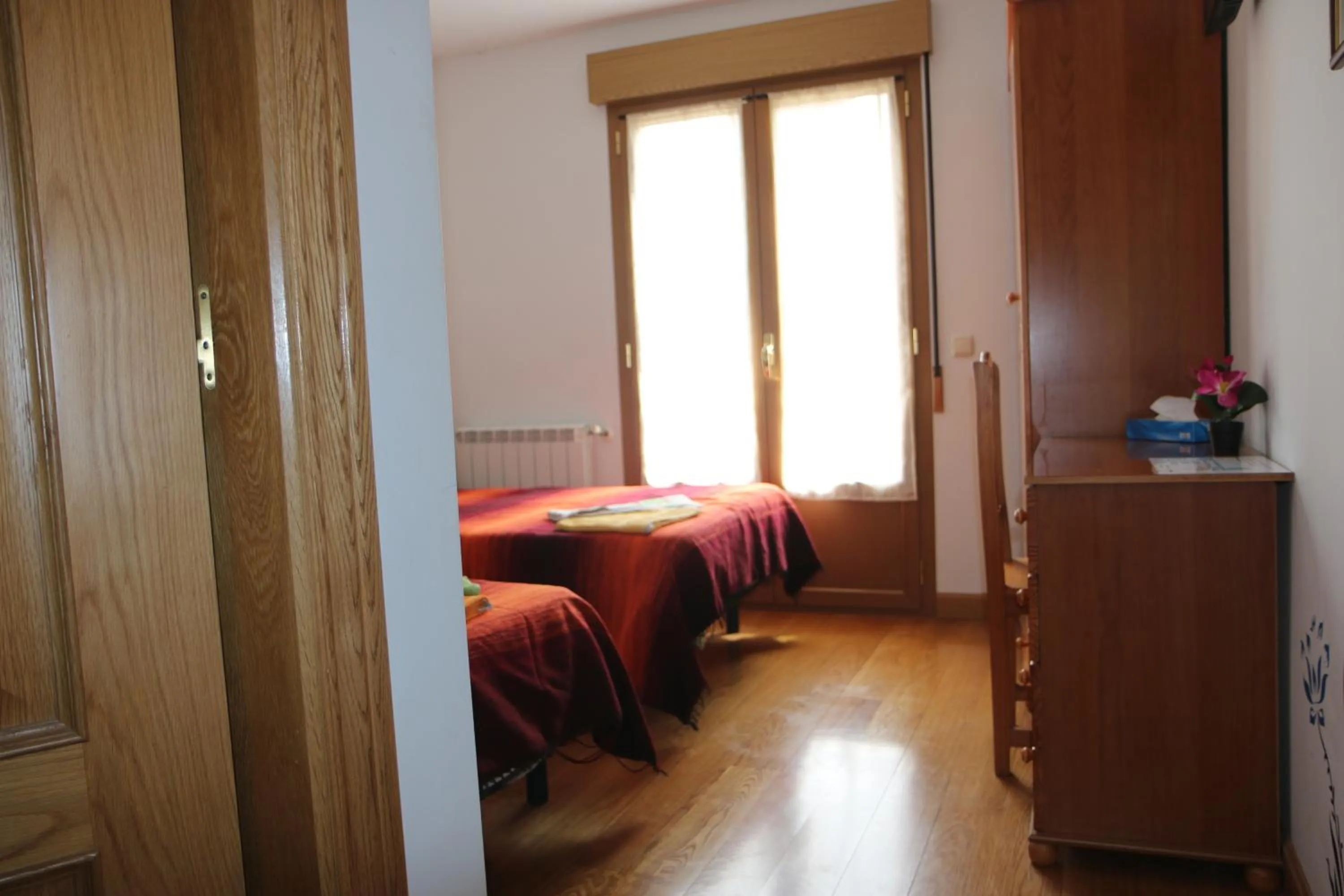 Bed in Hostal La Plaza