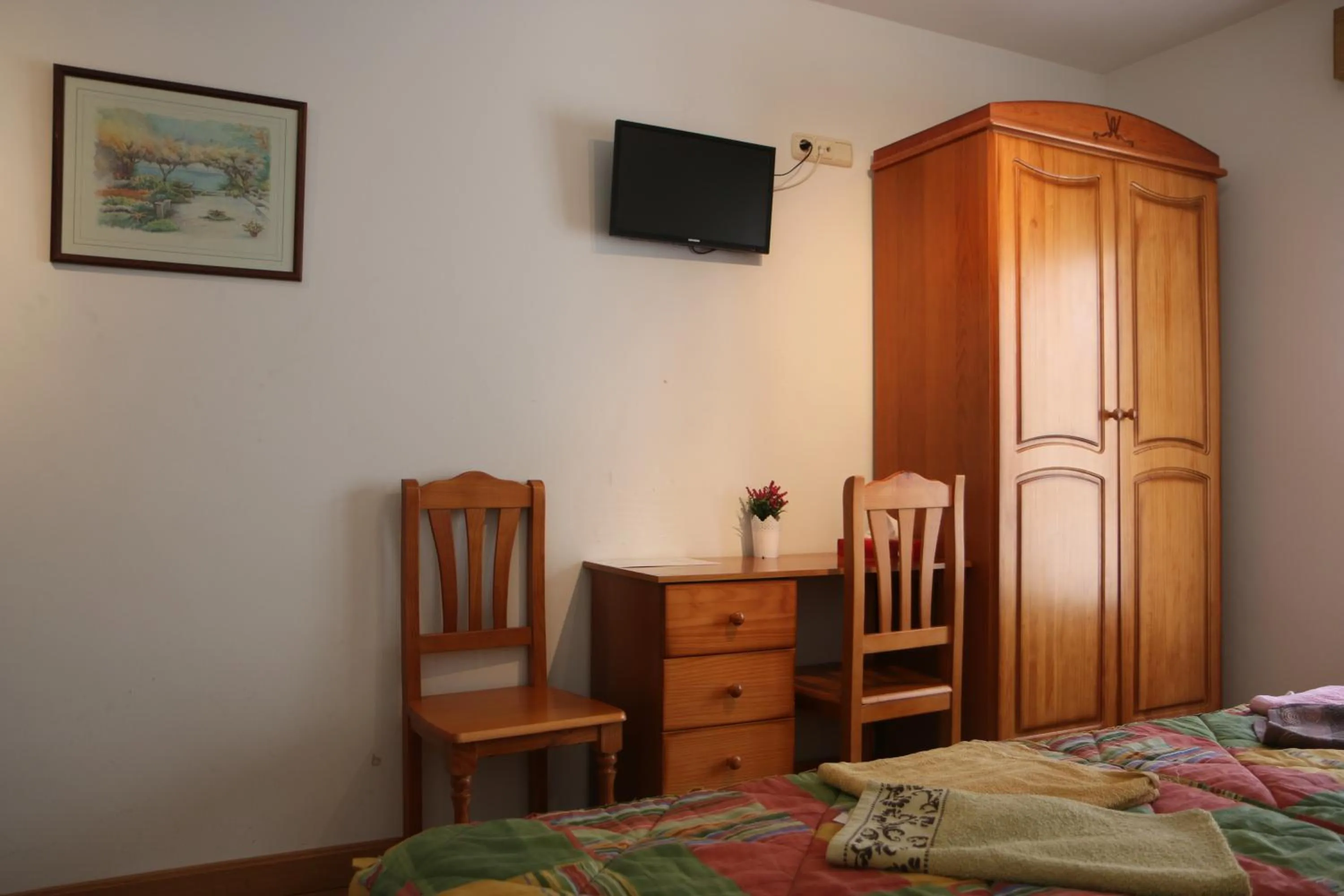 Bed in Hostal La Plaza