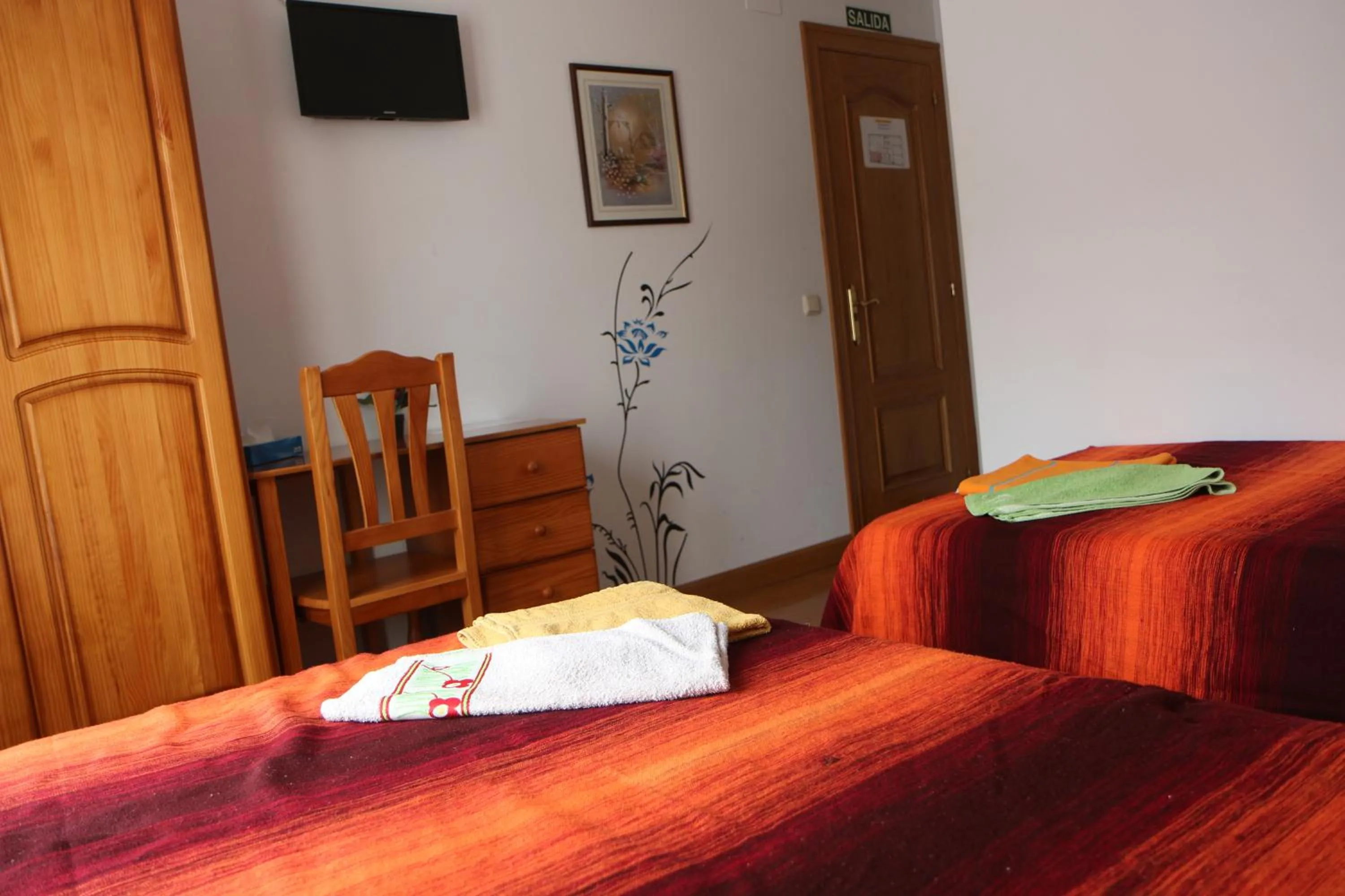 Bed in Hostal La Plaza