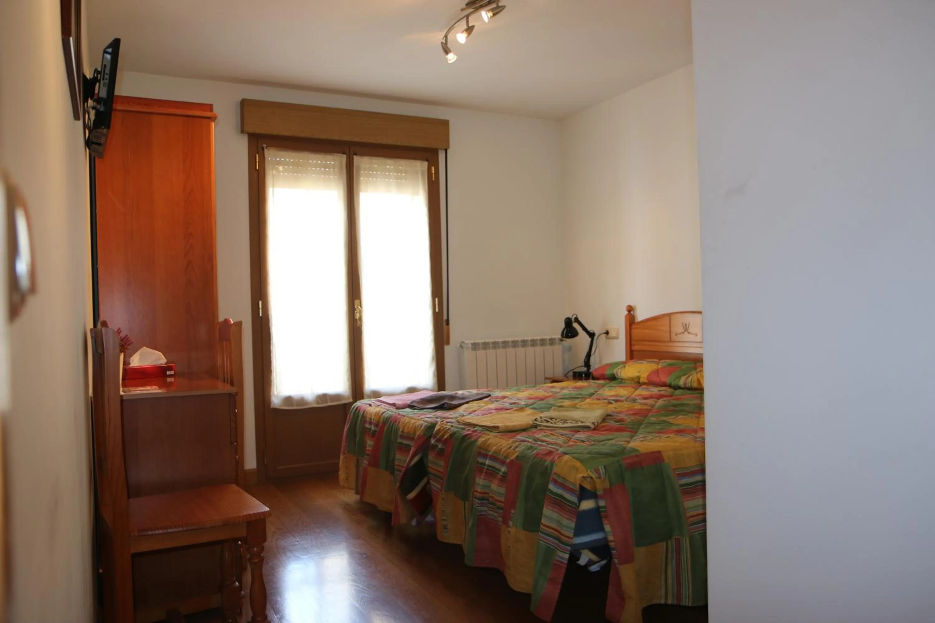 Bed in Hostal La Plaza