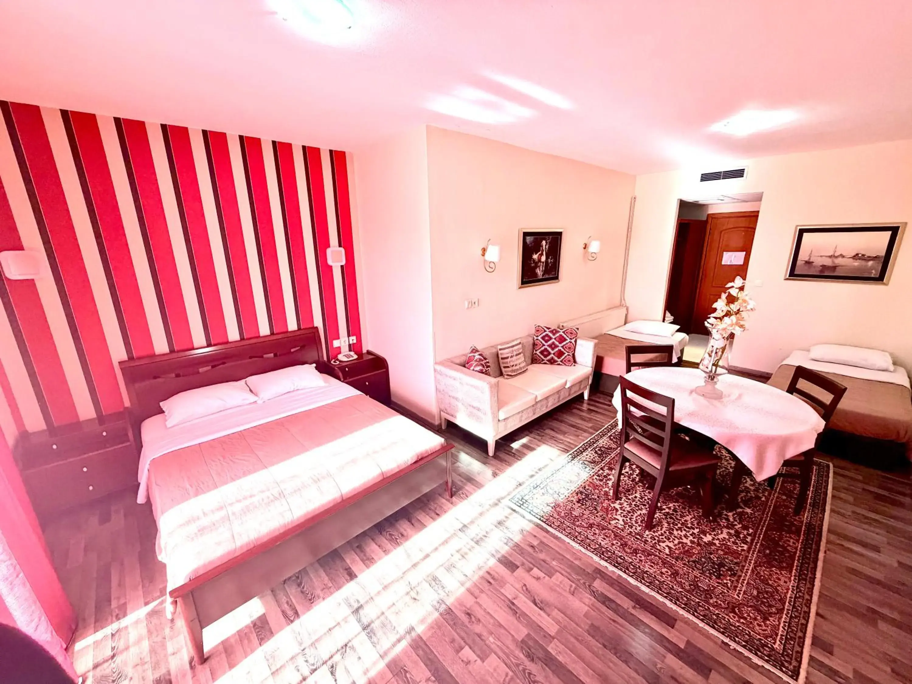 Standard Quadruple Room in Kornilios Istron Hotel Standard Quadruple Room in Kornilios Istron Hotel