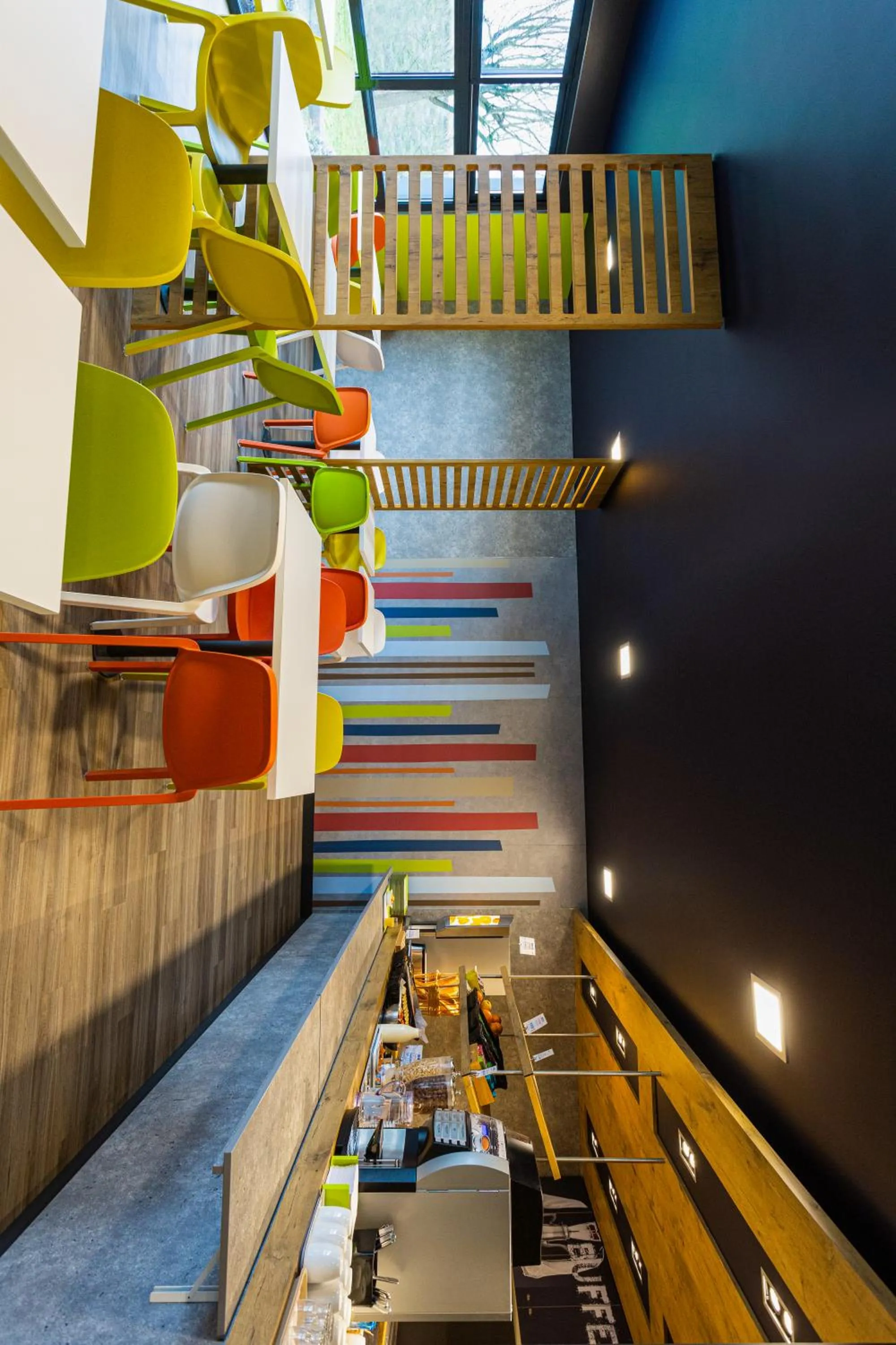 Communal lounge/ TV room in ibis budget Angoulême Nord