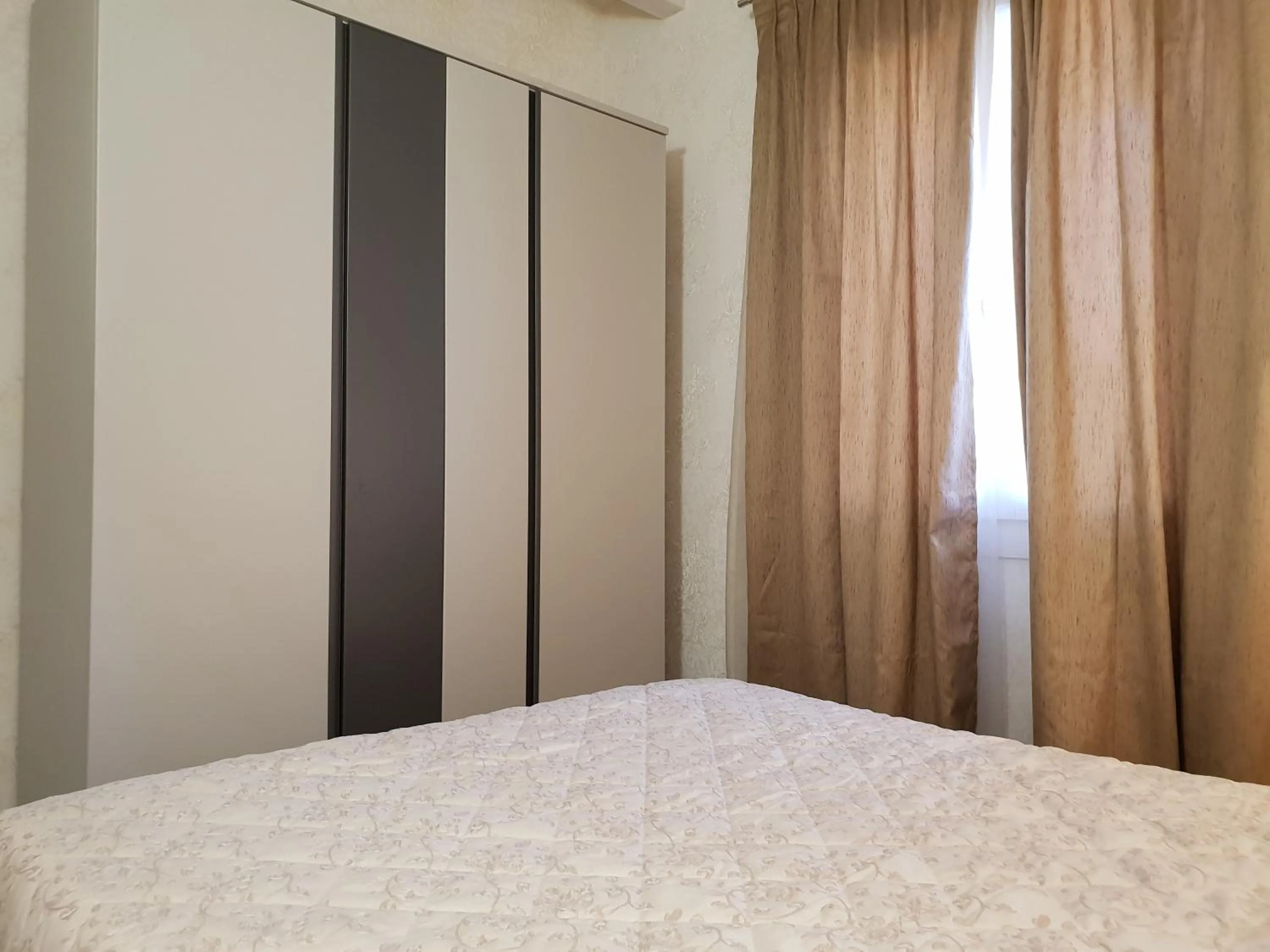 Bed in Sirmione Park View Luxury Apartments