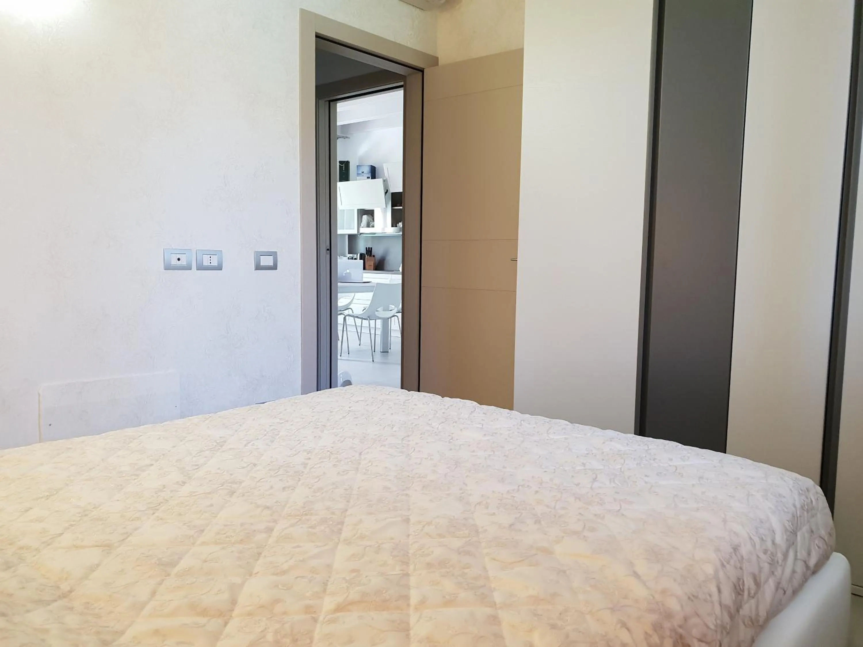 Bed in Sirmione Park View Luxury Apartments