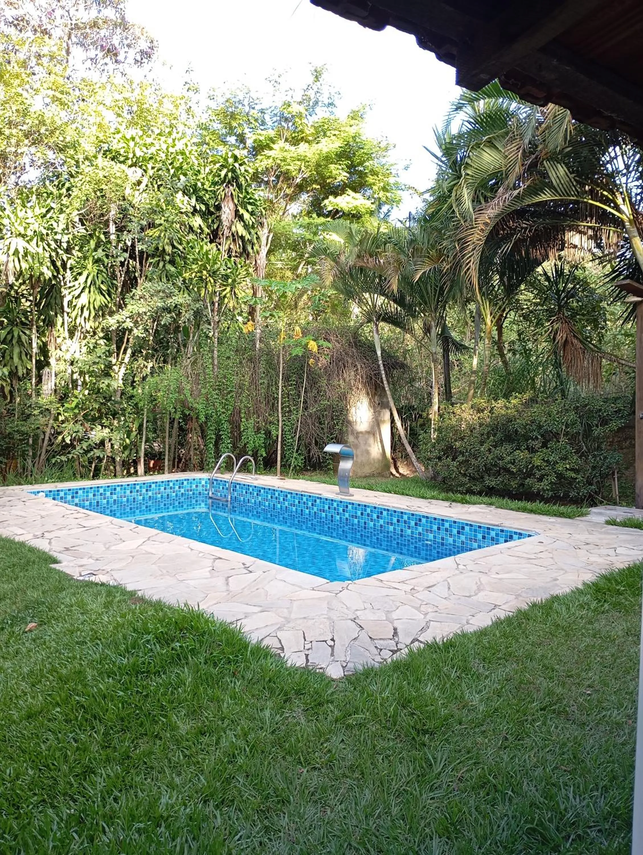 Swimming pool in Chalé Rancho Aratama