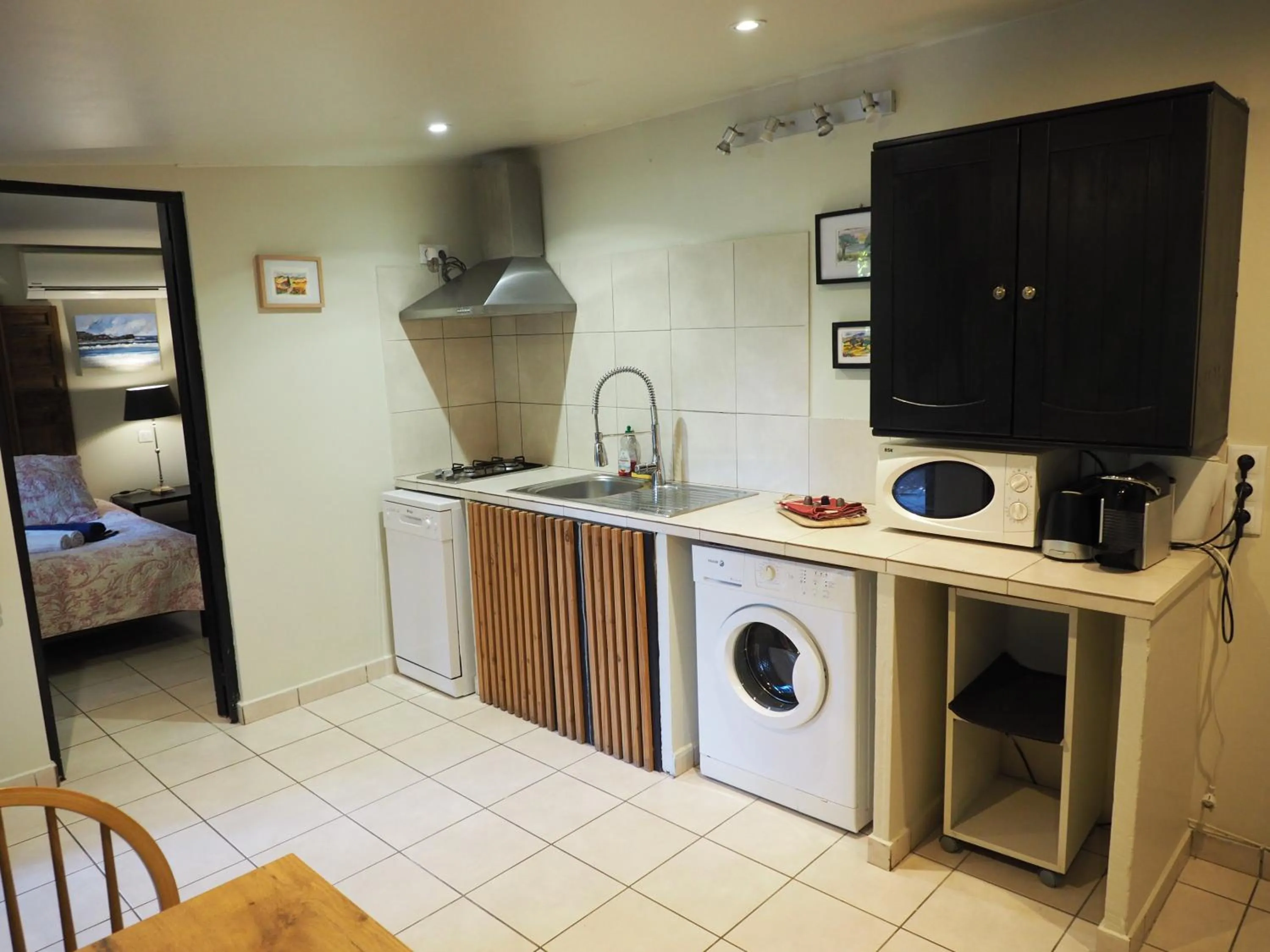 Kitchen or kitchenette in Maranatha, front de mer avec plage