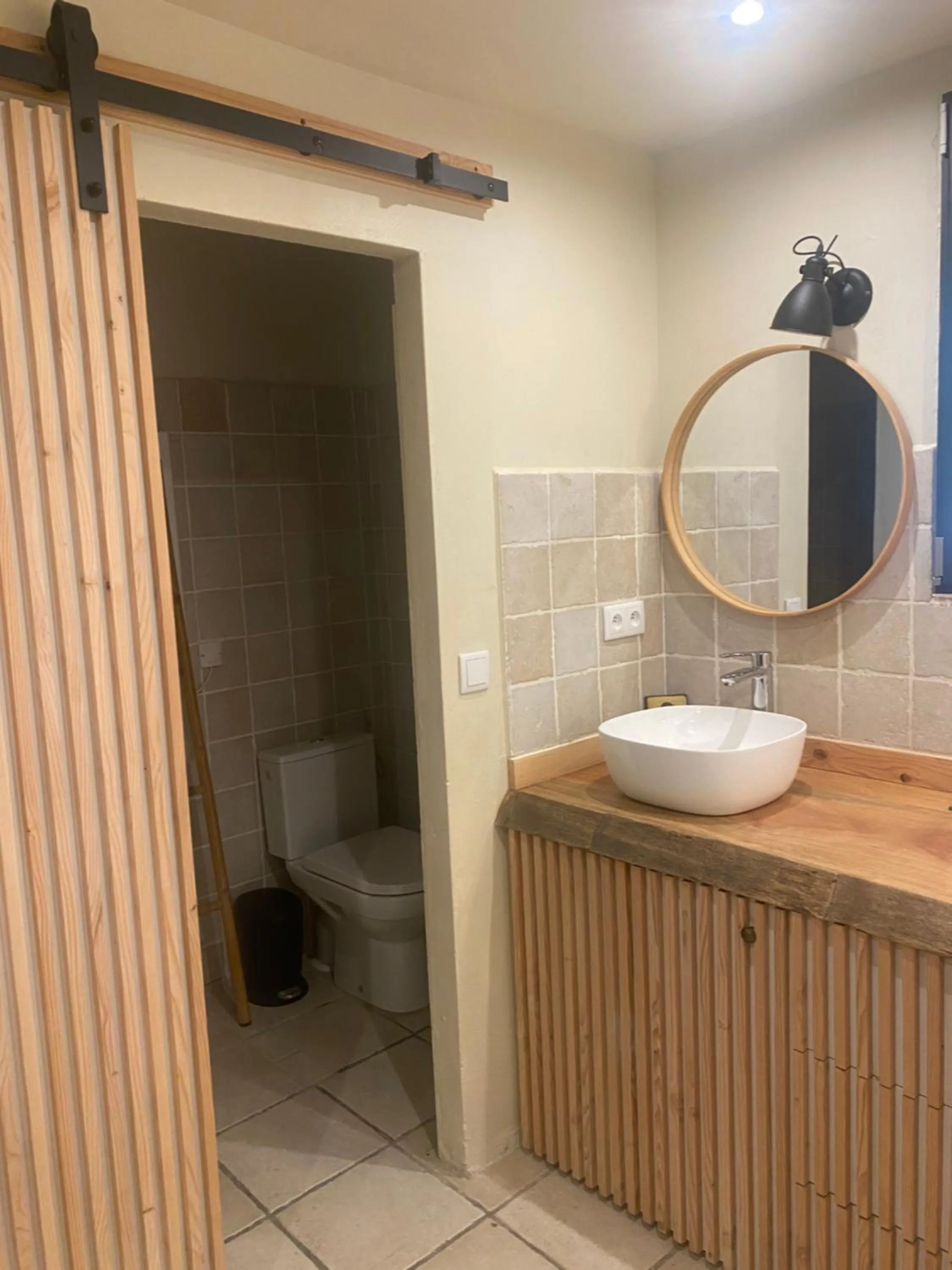 Bathroom in Maranatha, front de mer avec plage