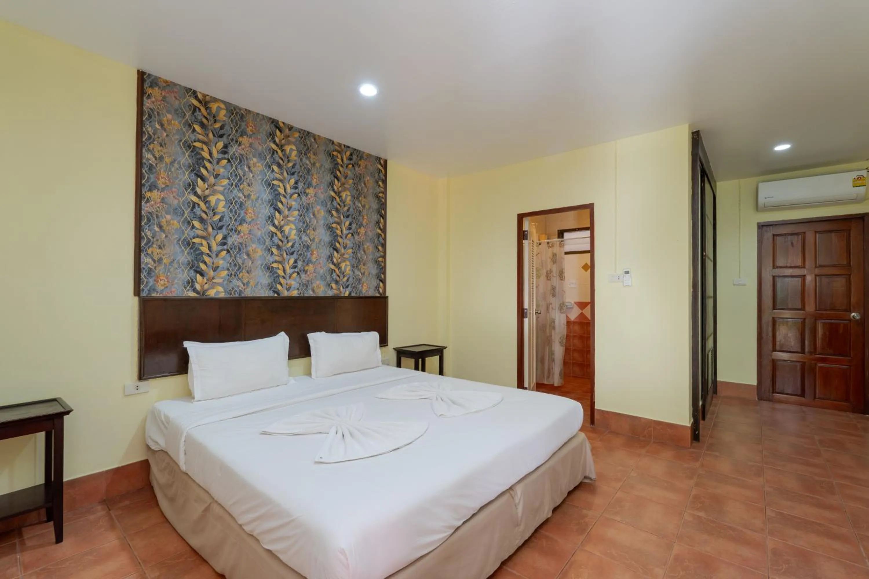 Bed in Amarin Hotel Patong