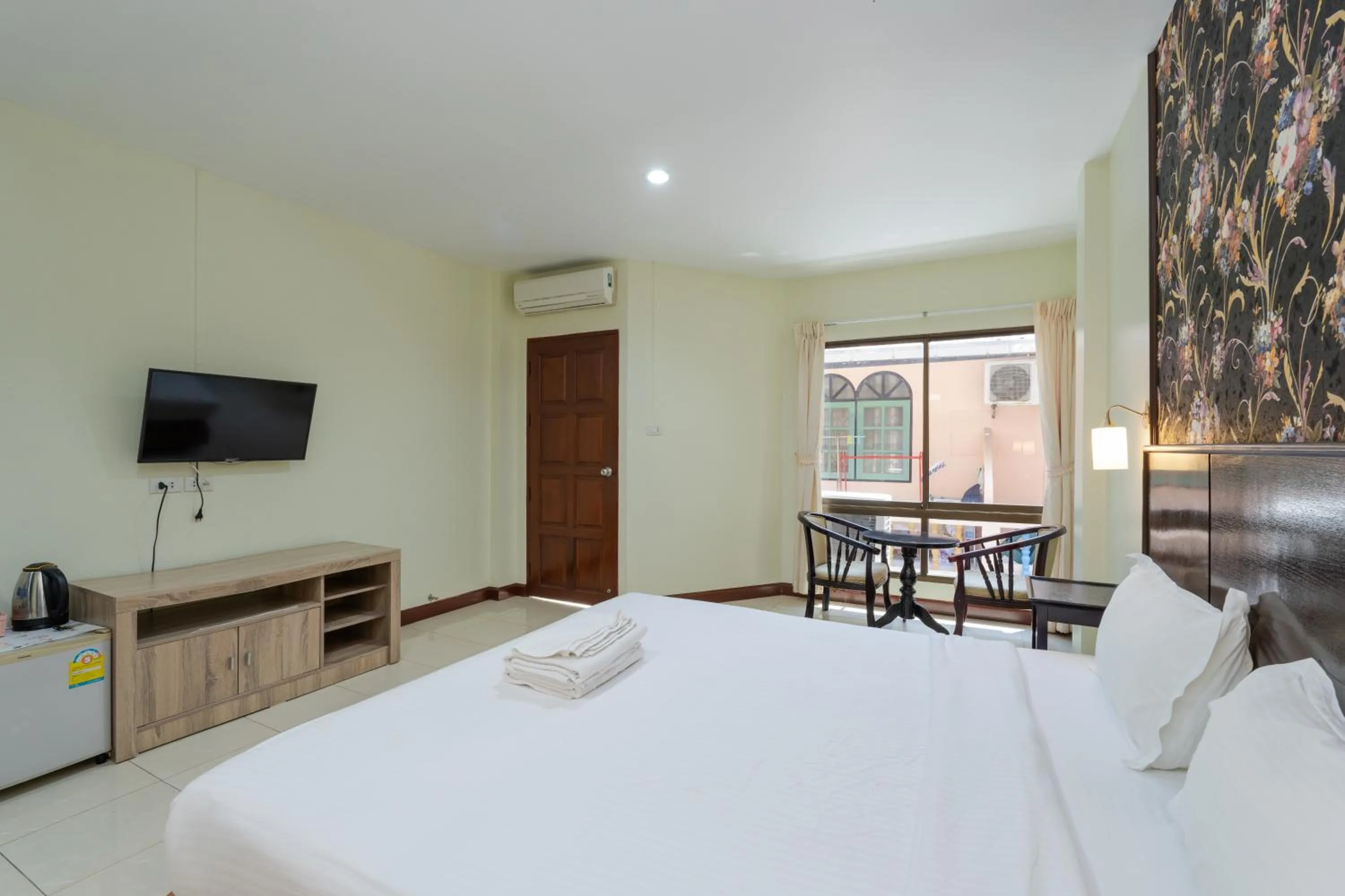 Bed in Amarin Hotel Patong