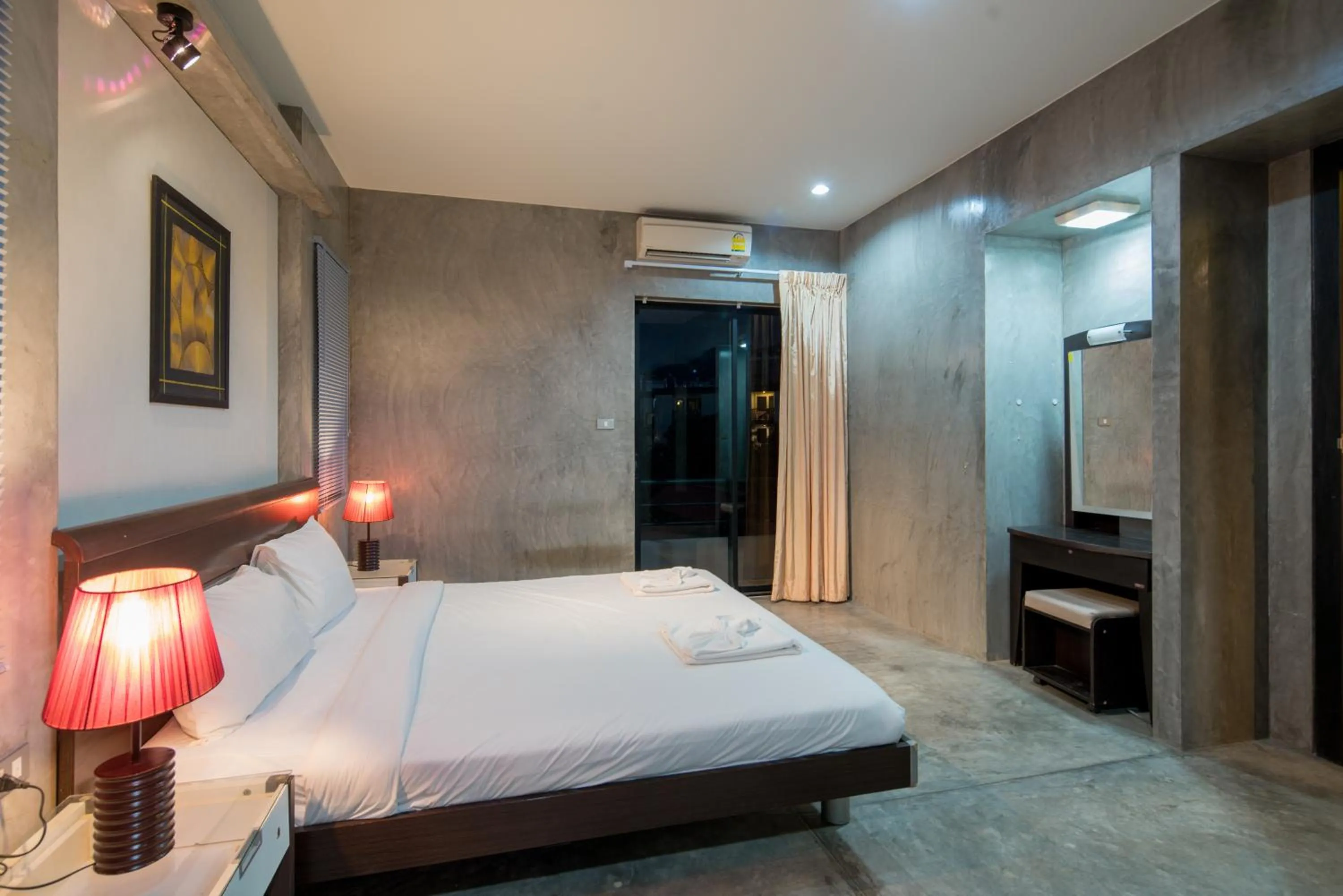 Bed in Amarin Hotel Patong