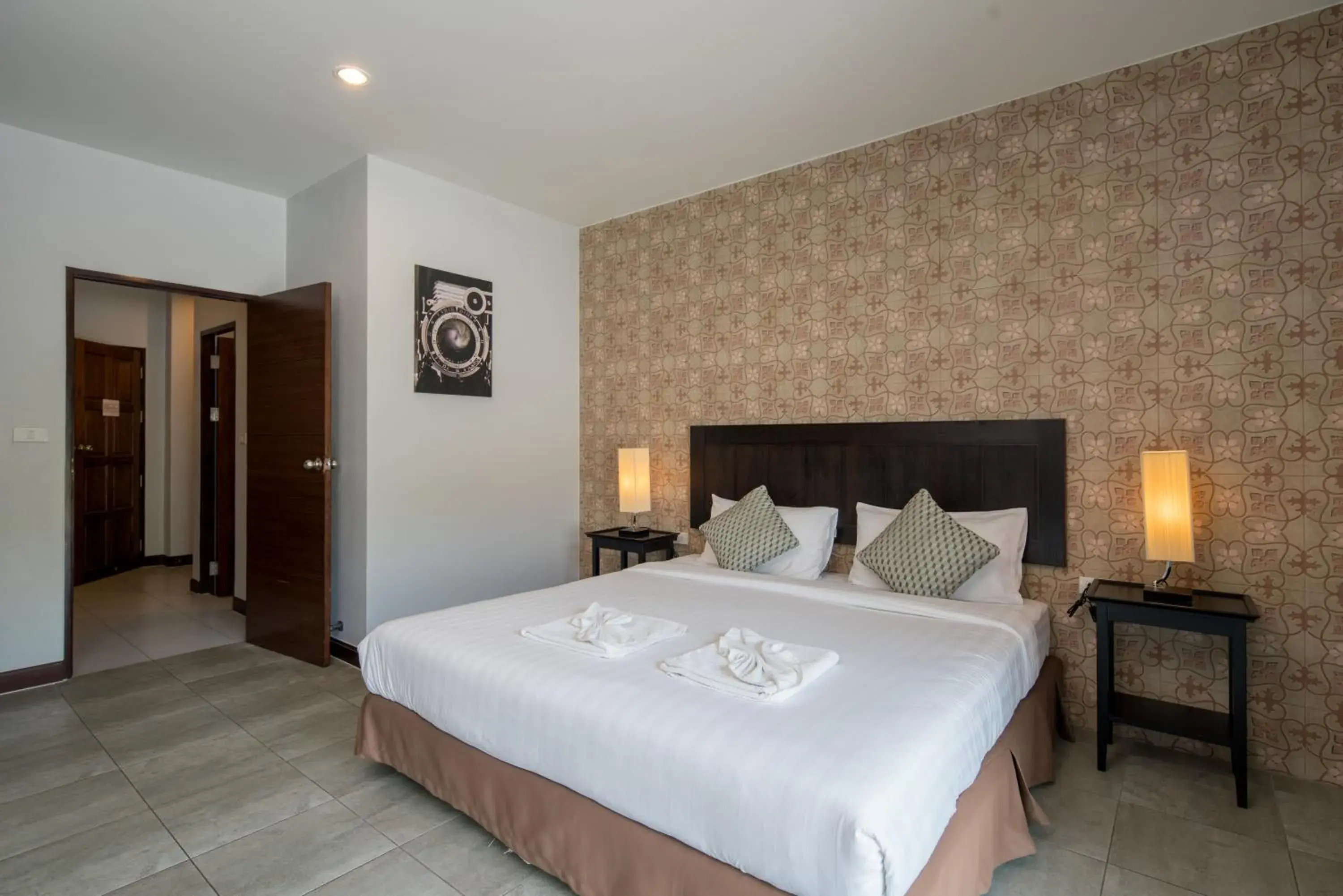 Bed in Amarin Hotel Patong Bed in Amarin Hotel Patong