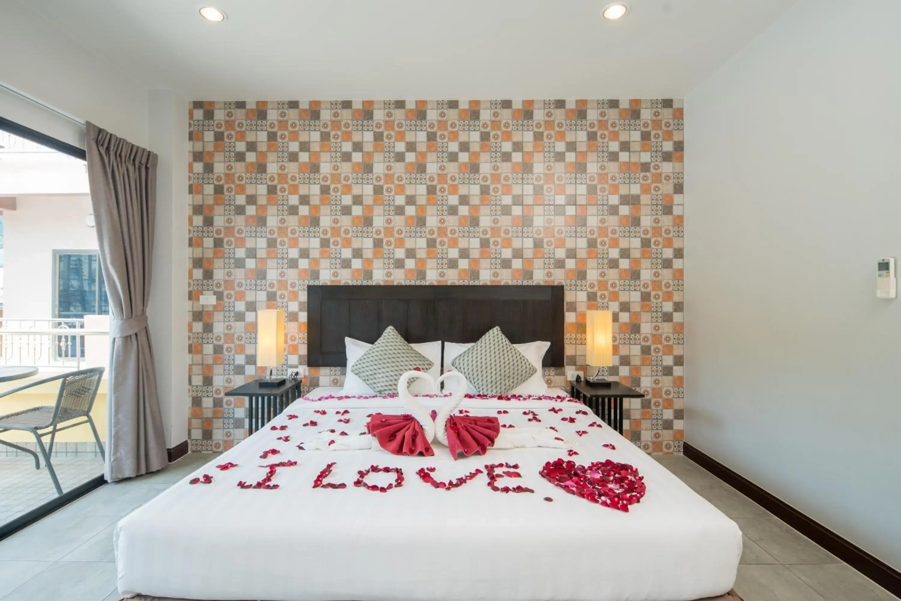 Bed in Amarin Hotel Patong Bed in Amarin Hotel Patong