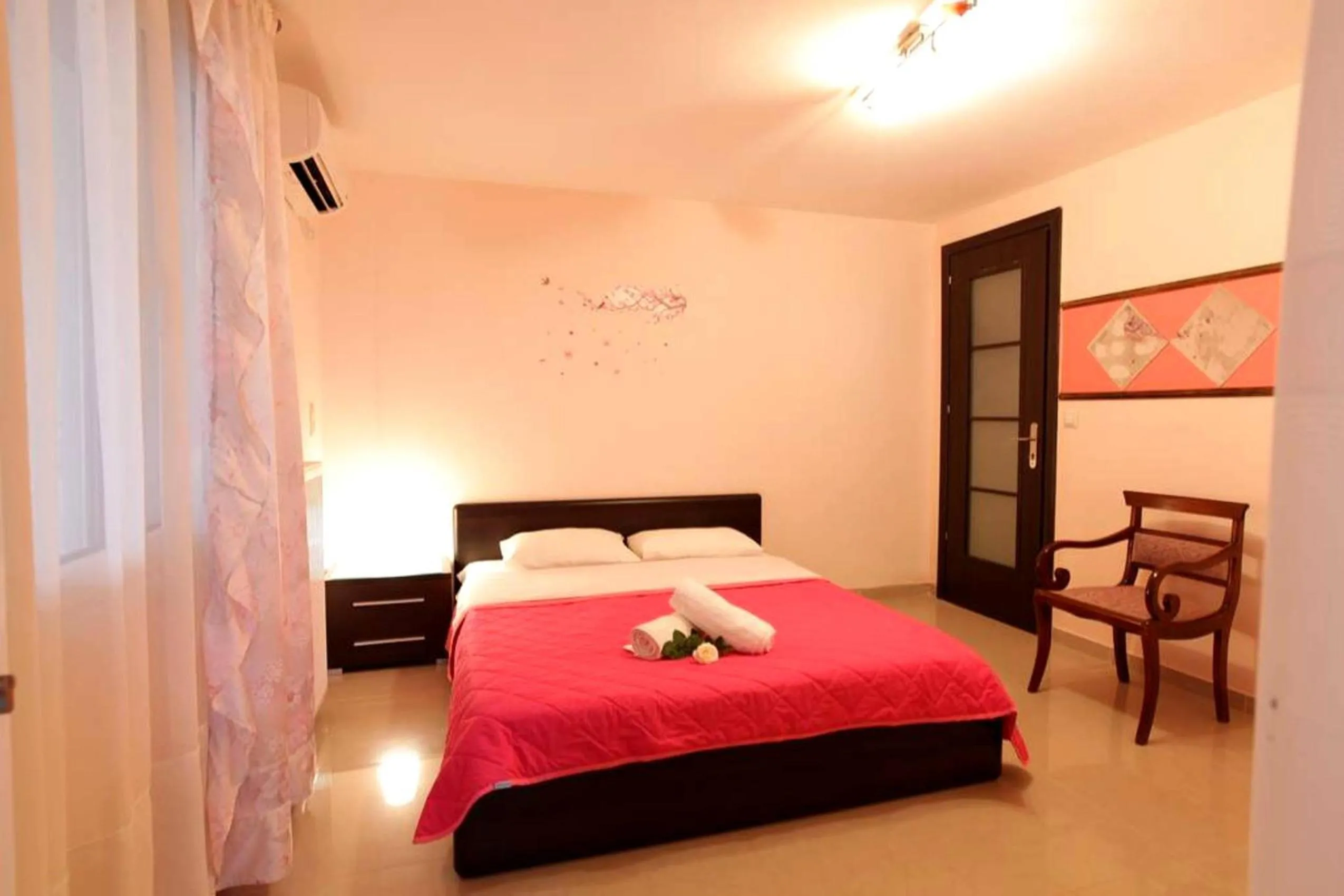 Bed in Villa Christine - Maisonettes with fireplace