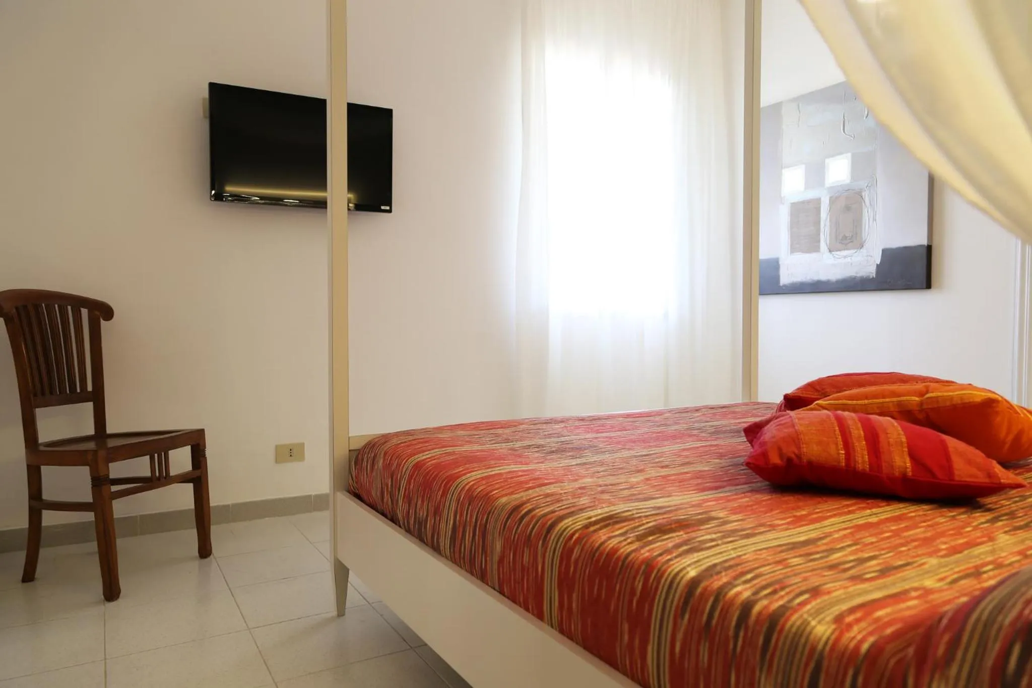 Bed in Centro Vacanze Poker