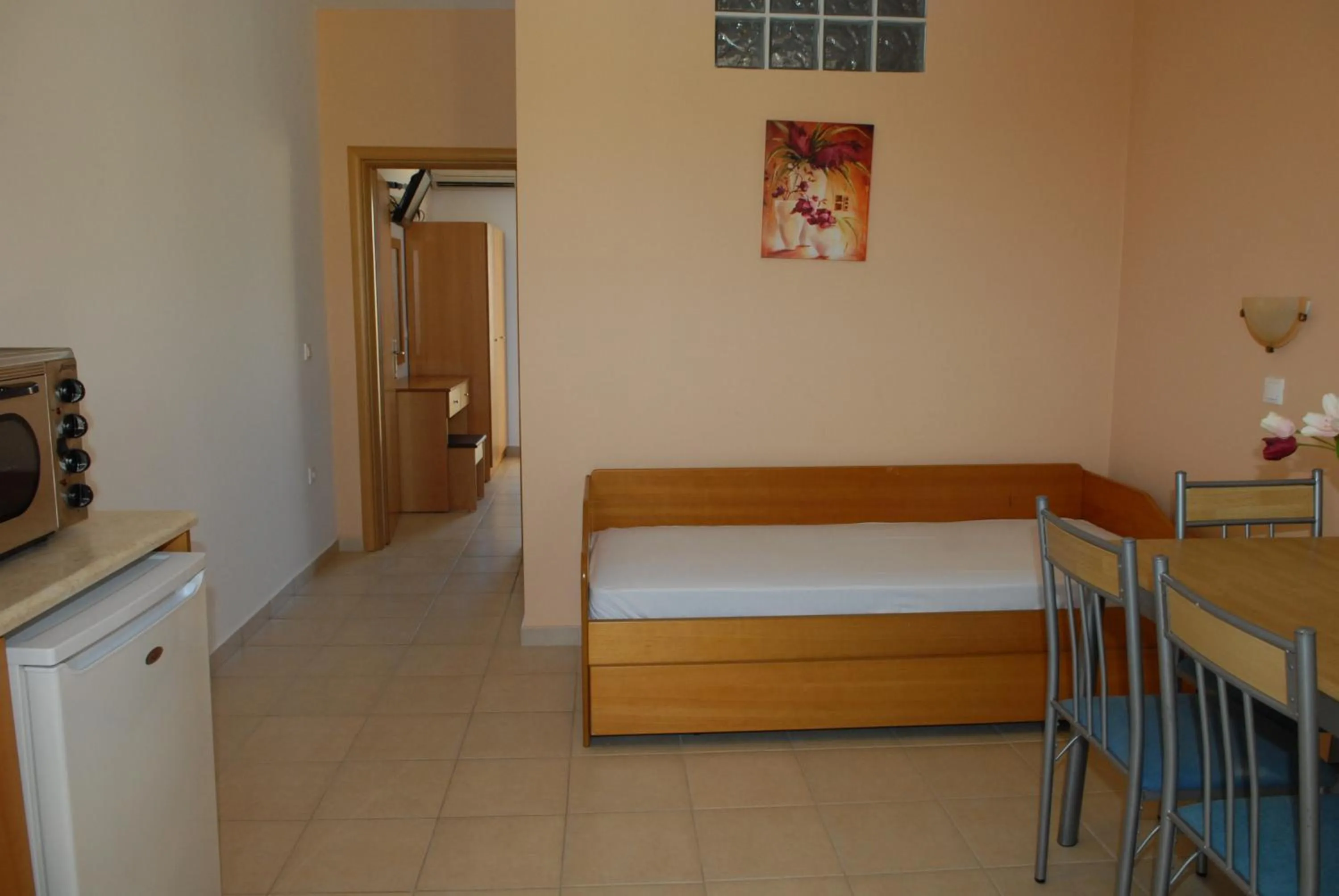 Bed in Barbie Hotel Apartments
