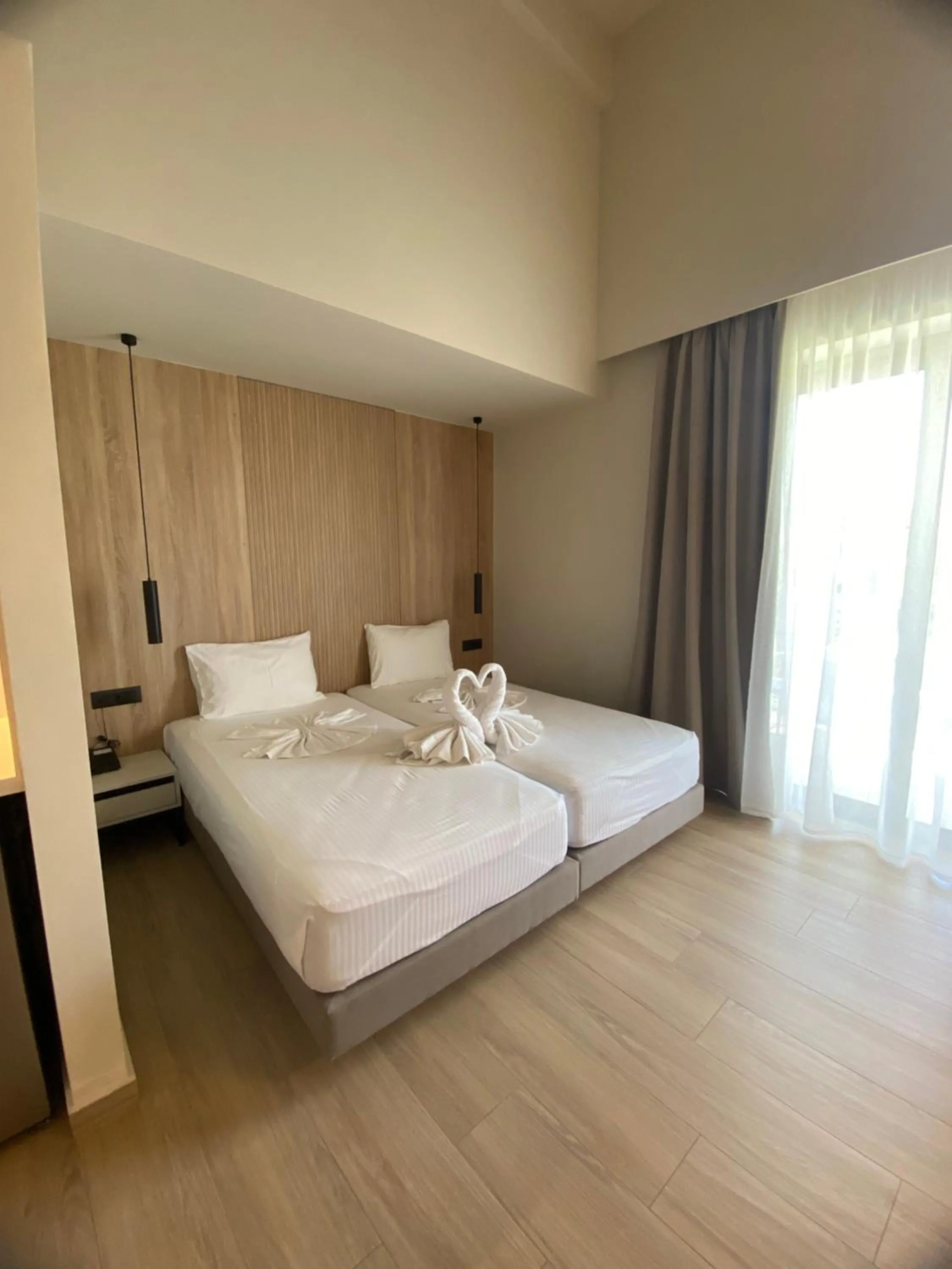 Bed in Barbie Hotel Apartments