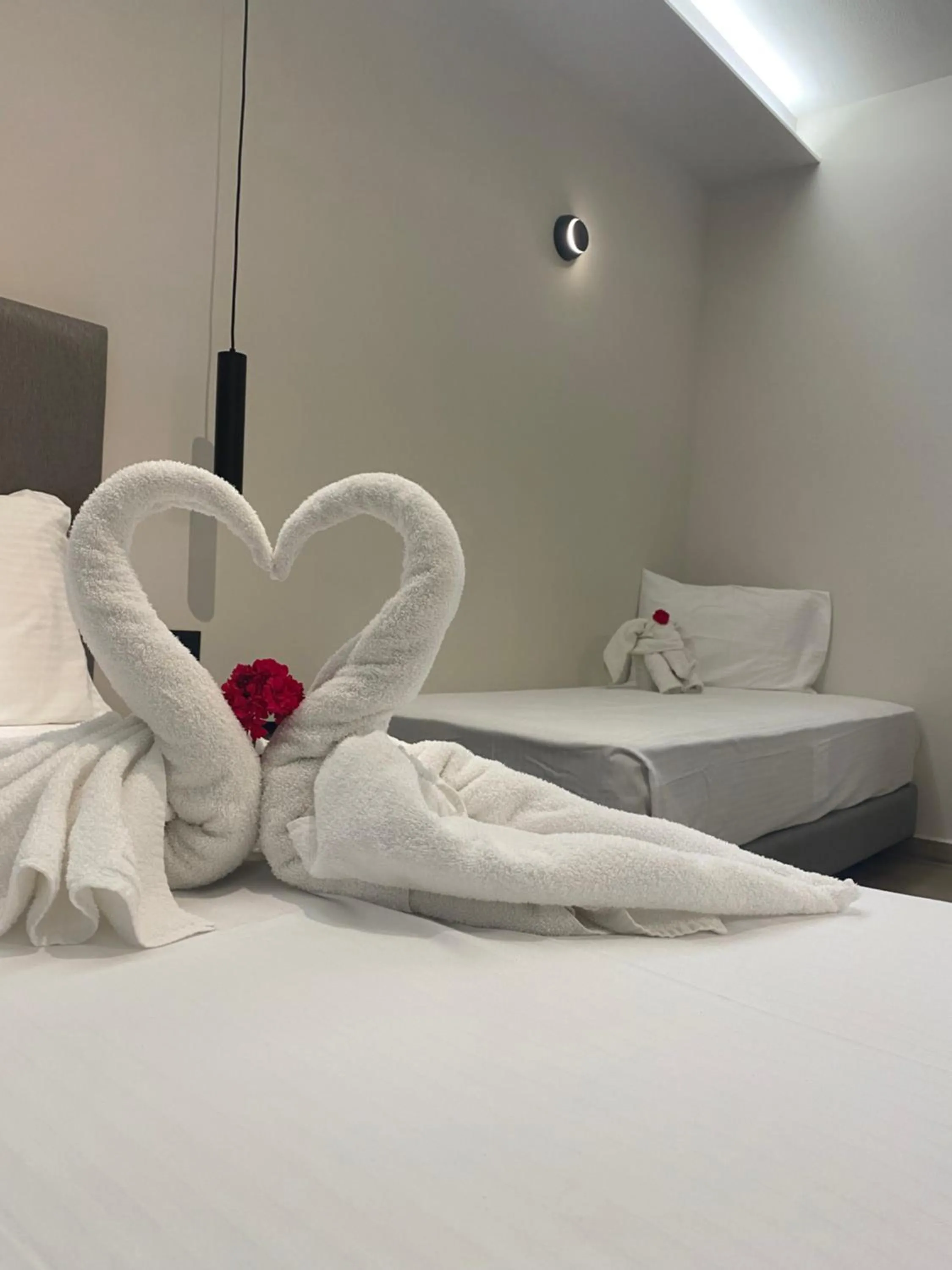 Bed in Barbie Hotel Apartments
