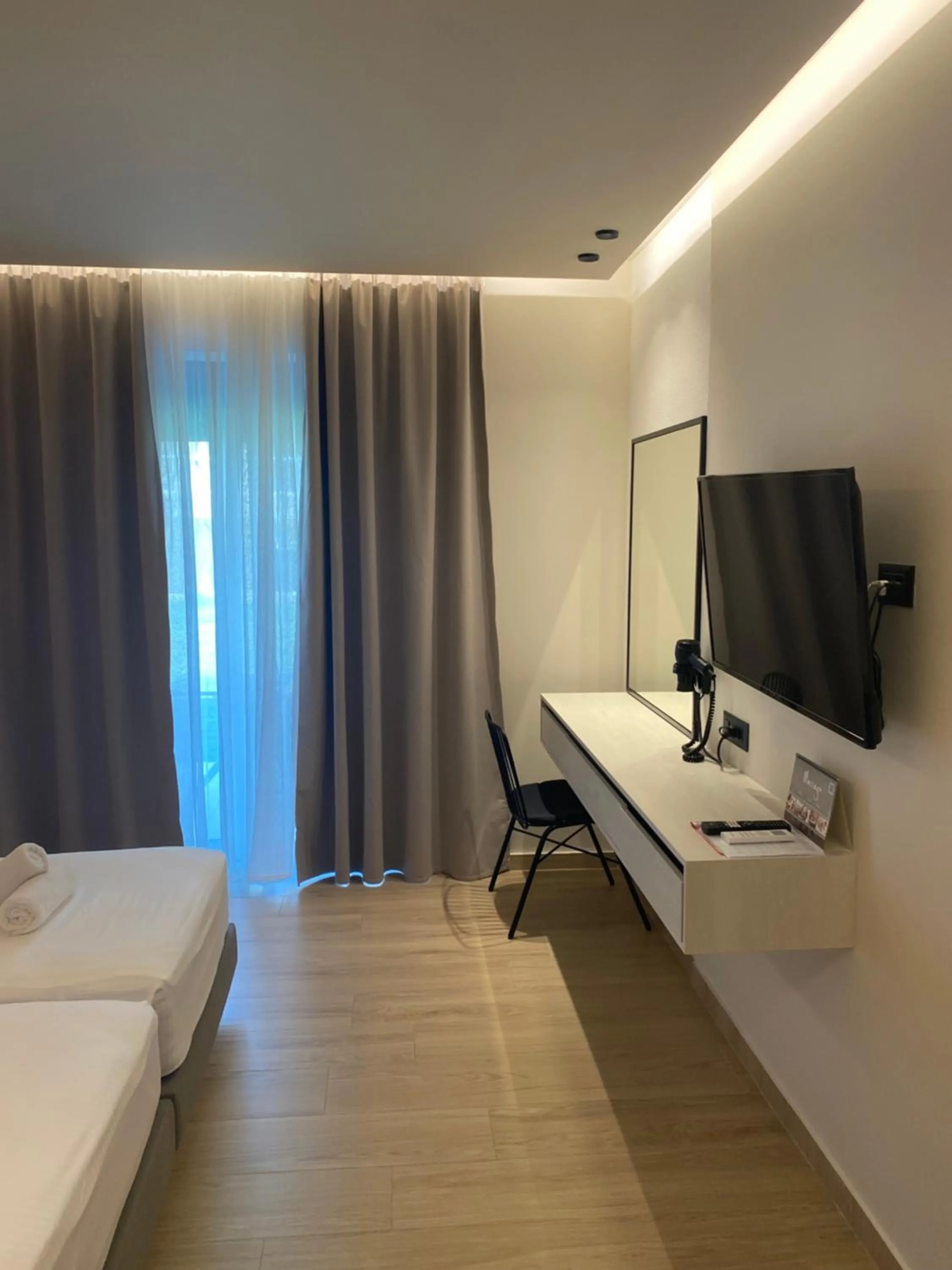 Bed in Barbie Hotel Apartments